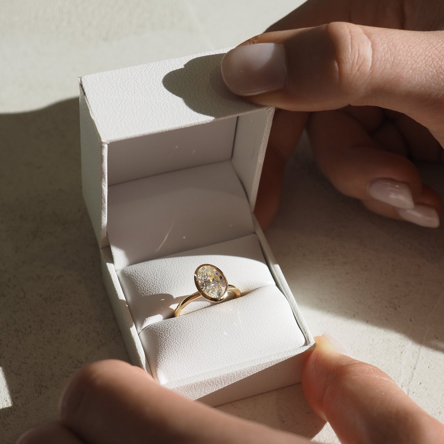 Solitaire Bezel-Oval Lab Grown Diamond Engagement Ring - Lifestyle