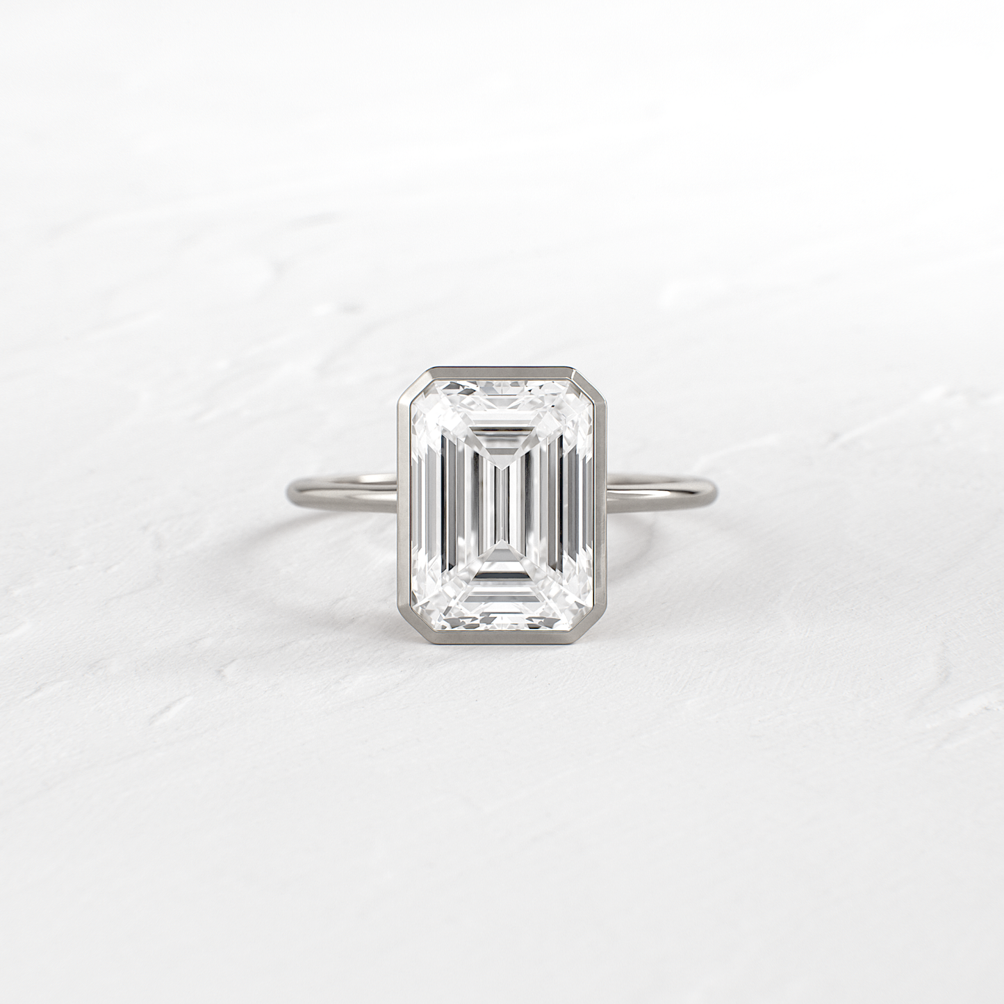 Solitaire Bezel with Hidden Stone-Emerald Lab Grown Diamond Engagement Ring - Detail view