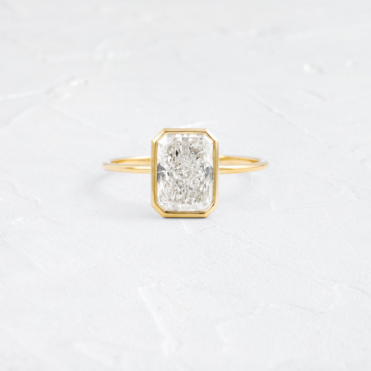 Solitaire Bezel with Hidden Stone-Radiant Lab Grown Diamond Engagement Ring - Front view