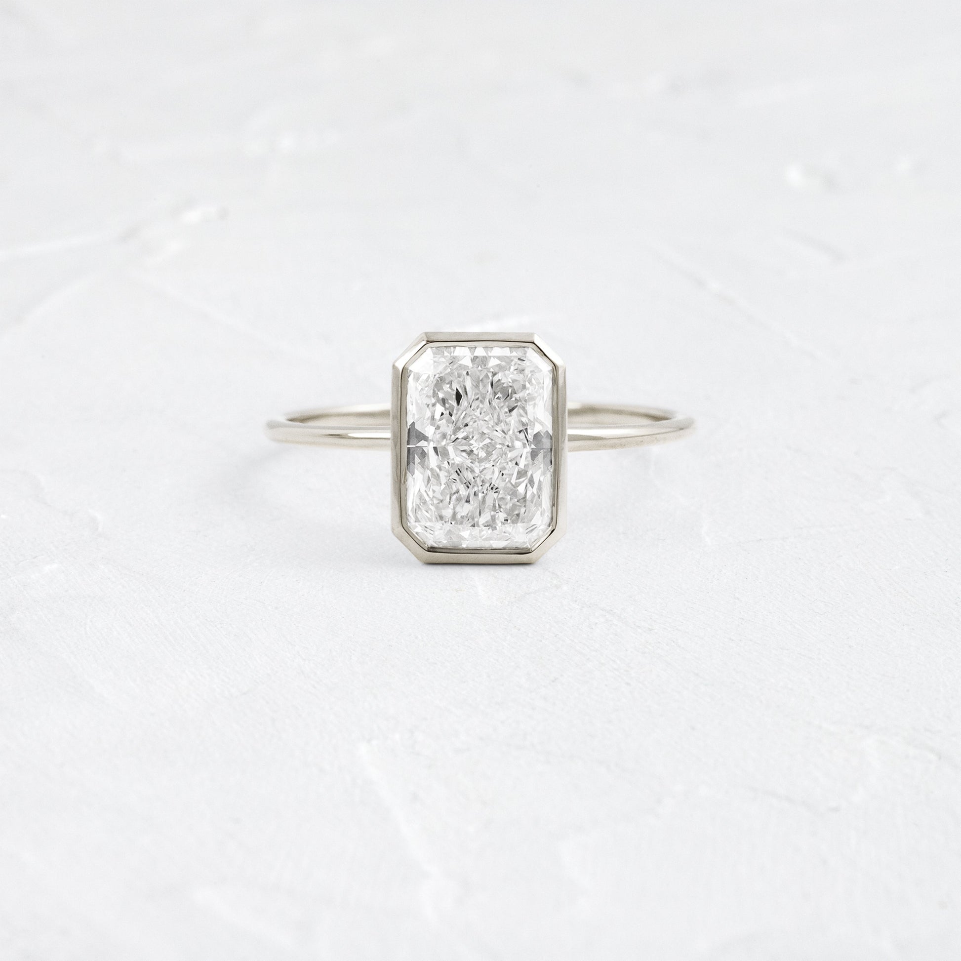 Solitaire Bezel with Hidden Stone-Radiant Lab Grown Diamond Engagement Ring - Back view