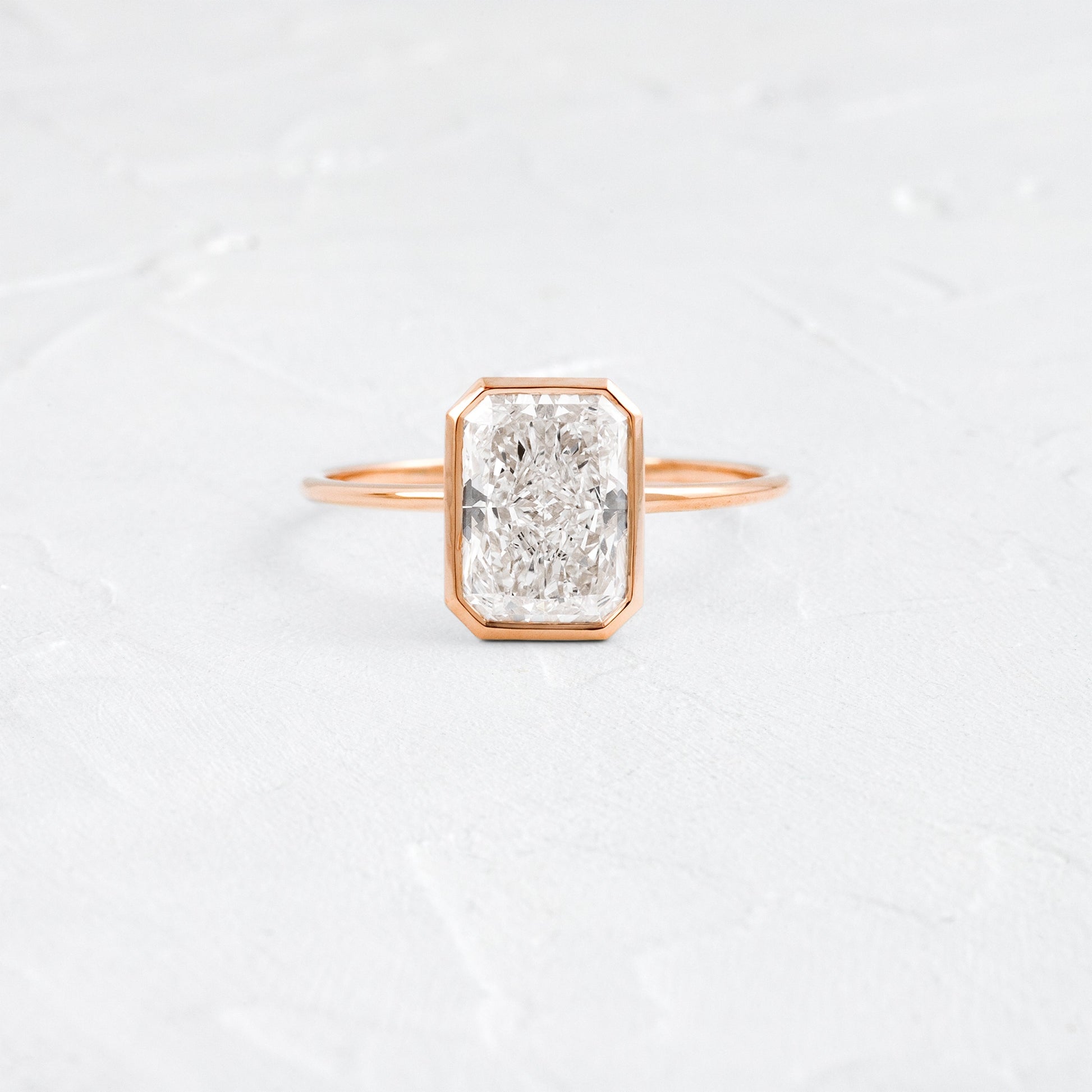 Solitaire Bezel with Hidden Stone-Radiant Lab Grown Diamond Engagement Ring - Lifestyle