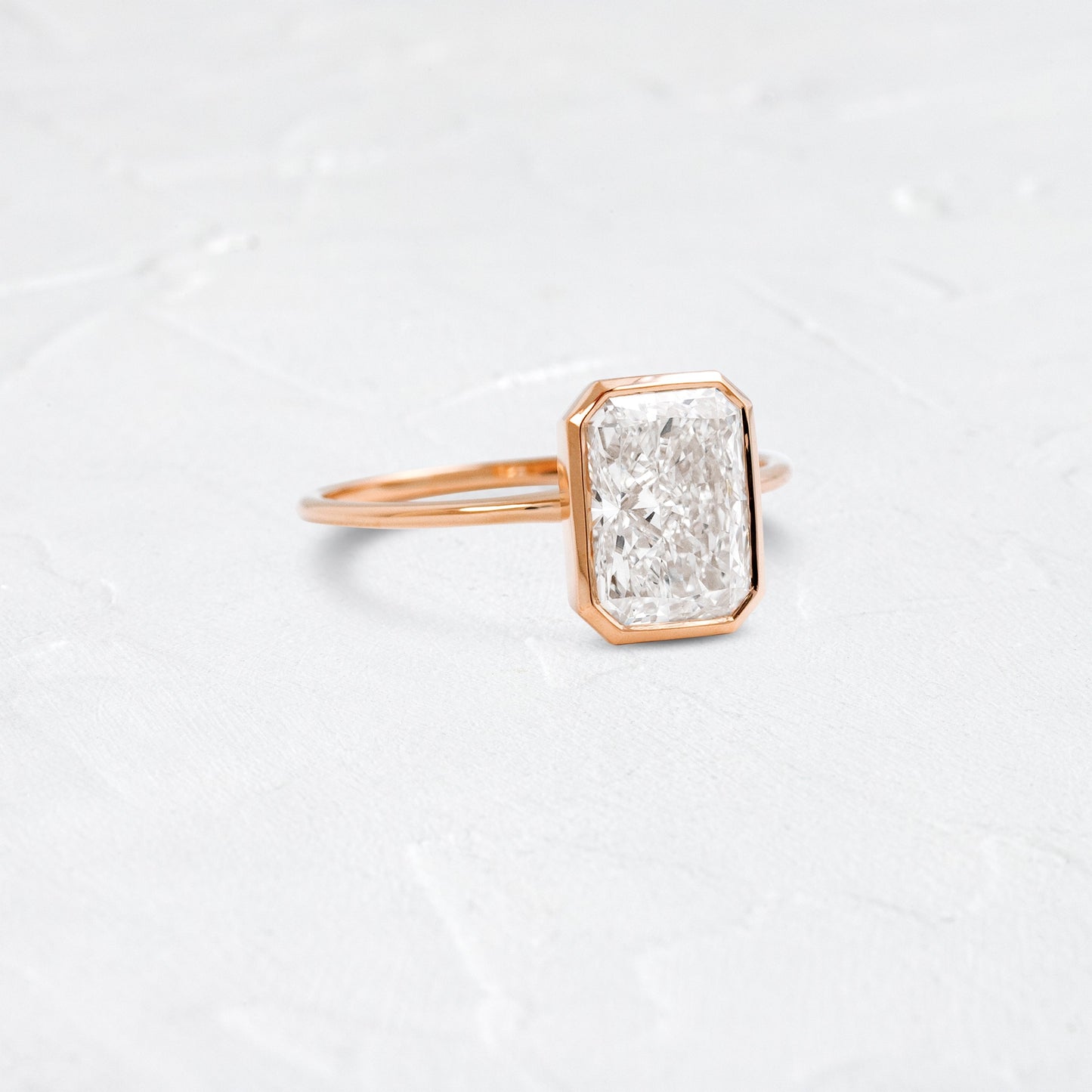 Solitaire Bezel with Hidden Stone-Radiant Lab Grown Diamond Engagement Ring - Front view