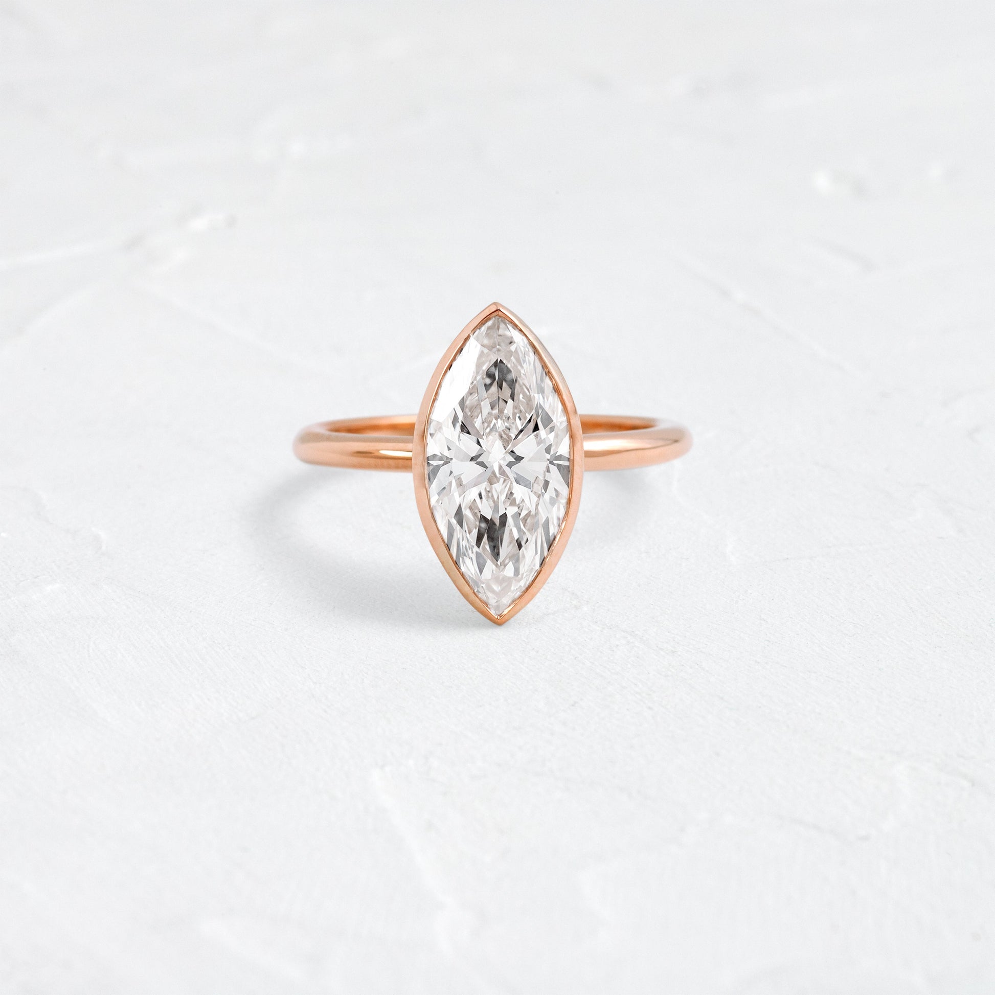 Solitaire Bezel with Hidden Stones-Marquise Lab Grown Diamond Engagement Ring - Side view