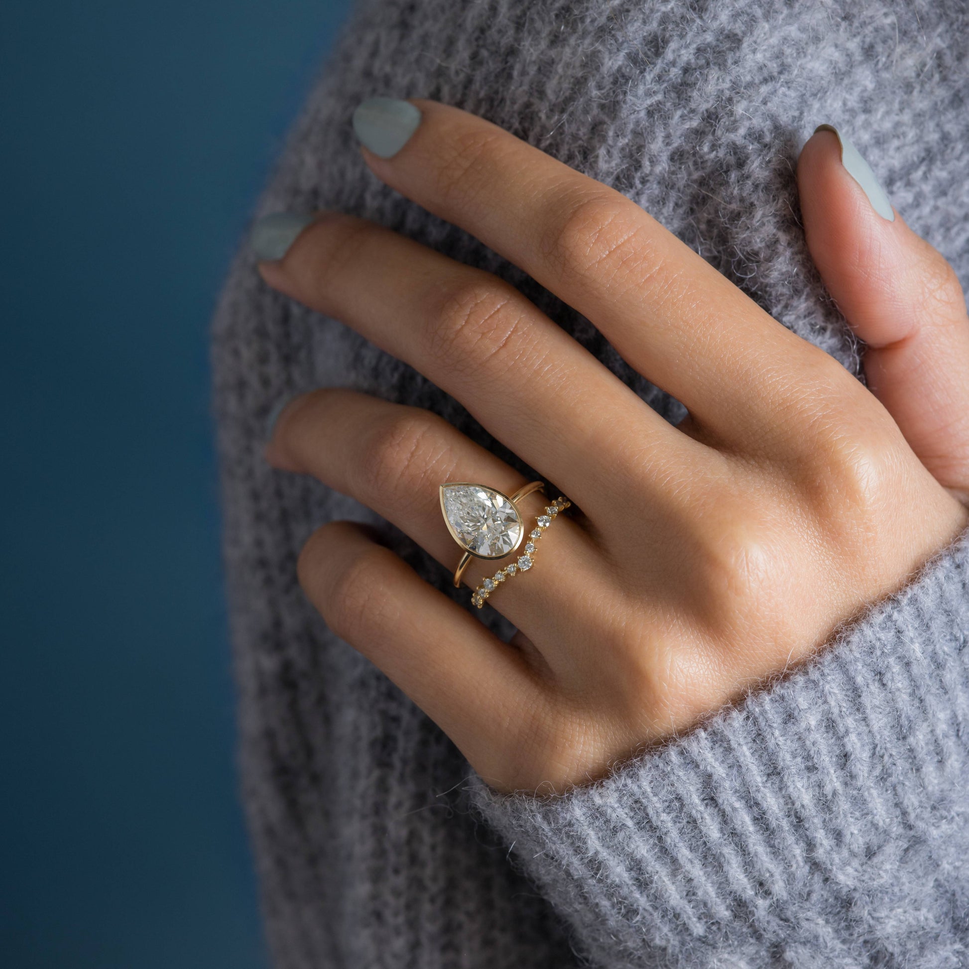 Solitaire Bezel with Hidden Stones-Pear Lab Grown Diamond Engagement Ring - Lifestyle