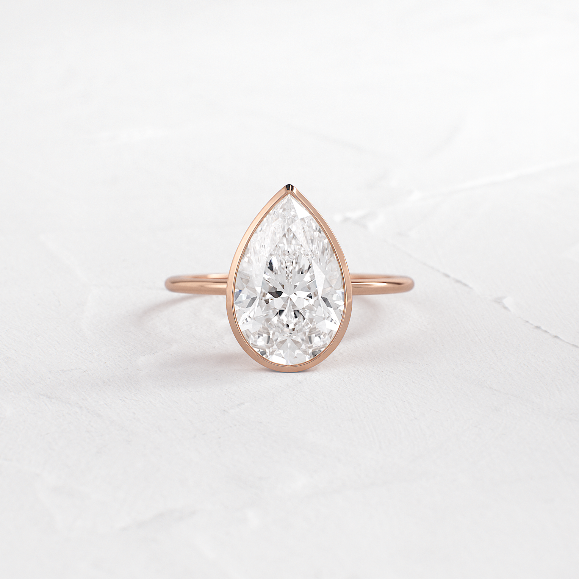 Solitaire Bezel with Hidden Stones-Pear Lab Grown Diamond Engagement Ring - Side view