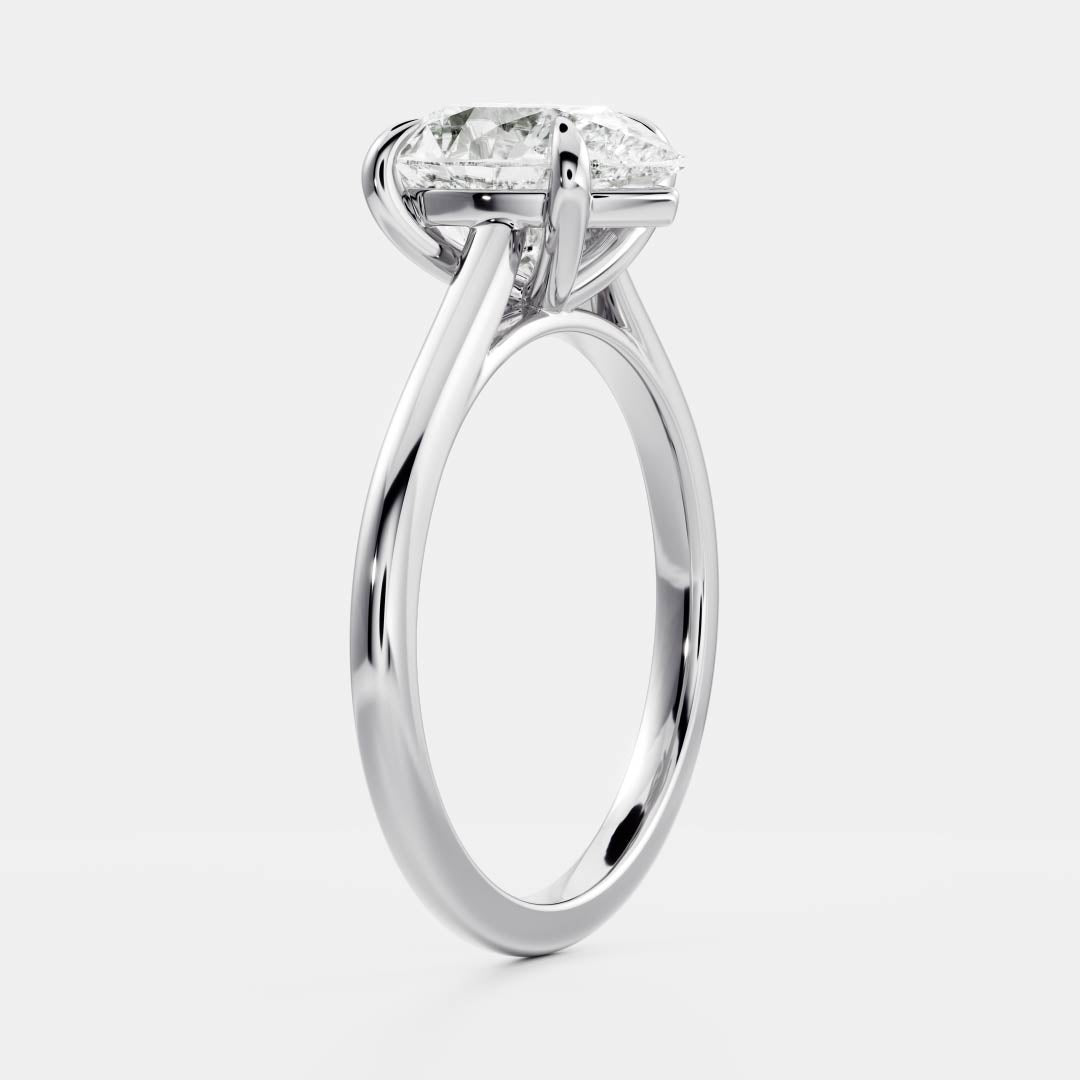 Solitaire Cathedral- 1.25 CT Pear Moissanite Engagement RingSolitaire Cathedral- 1.25 CT Pear Moissanite Engagement Ring - On model
