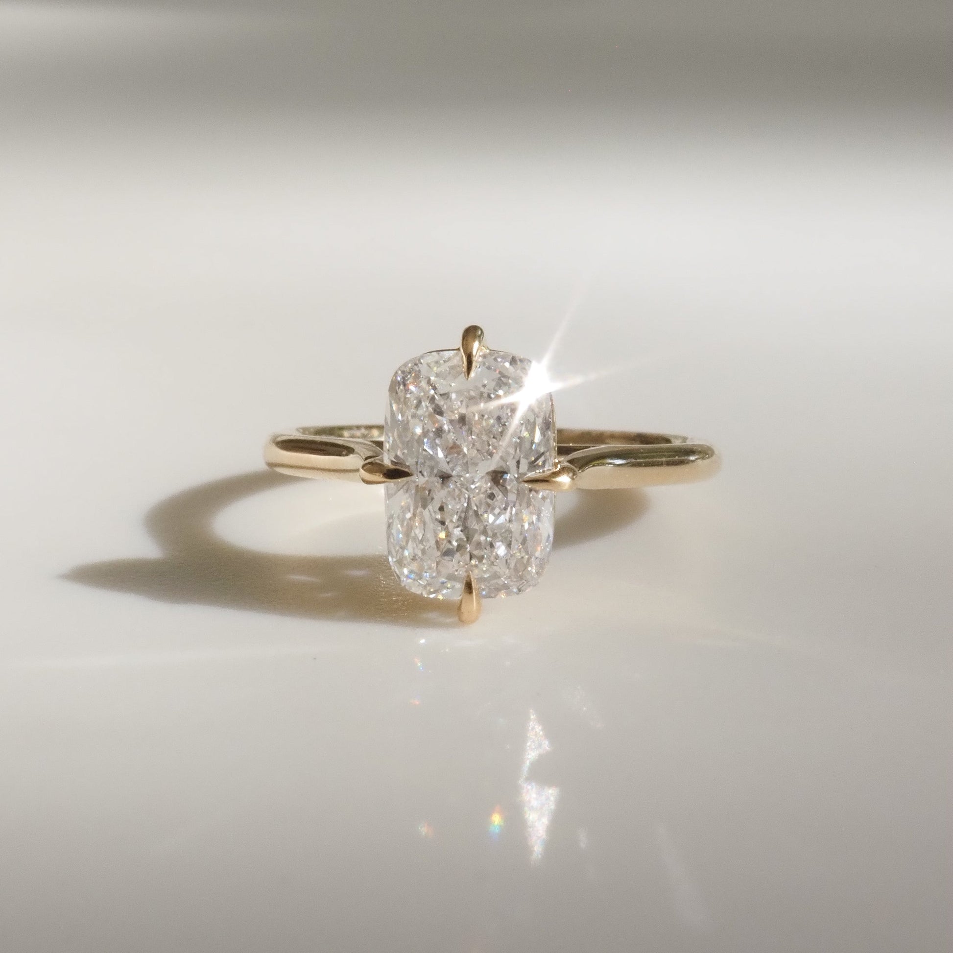 Solitaire Cathedral-Elongated Cushion Compass Prong Lab Grown Diamond Engagement Ring - Front view