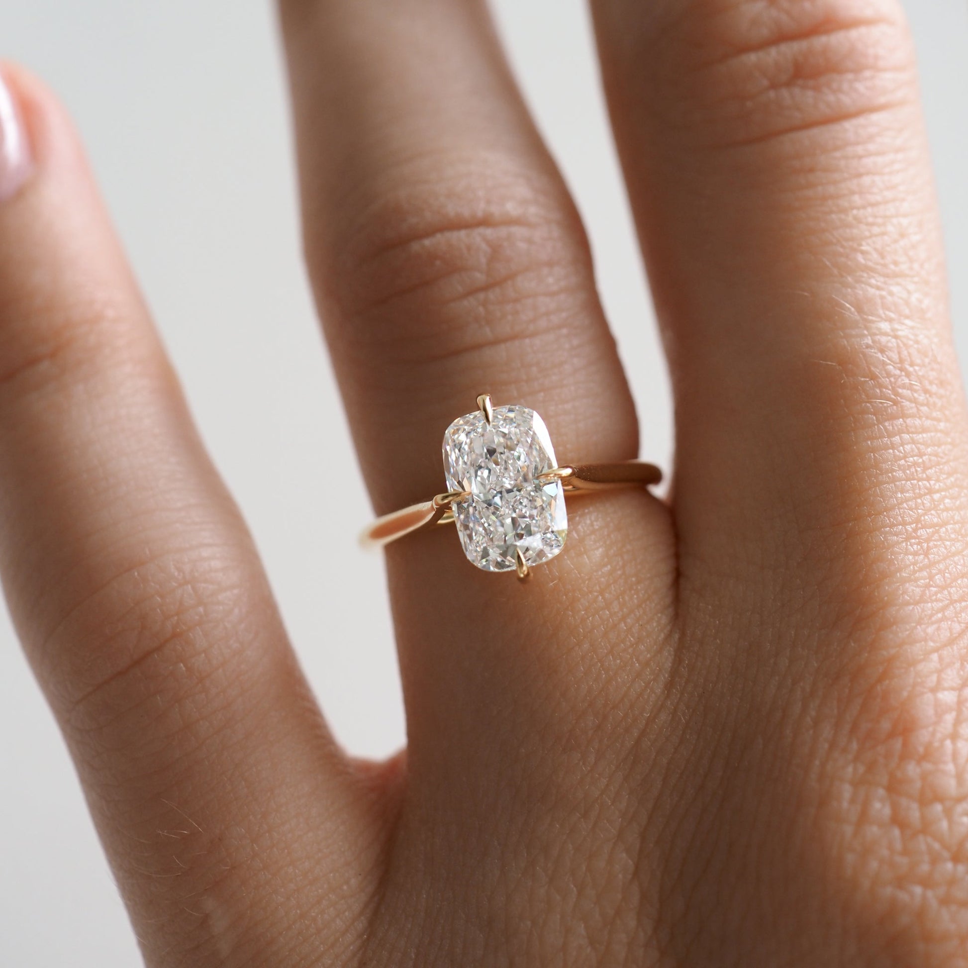 Solitaire Cathedral-Elongated Cushion Compass Prong Lab Grown Diamond Engagement Ring - Detail view