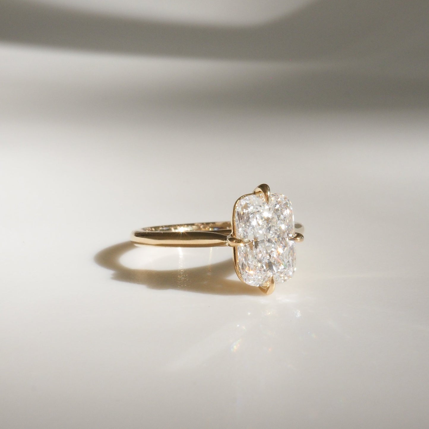 Solitaire Cathedral-Elongated Cushion Compass Prong Lab Grown Diamond Engagement Ring - On model