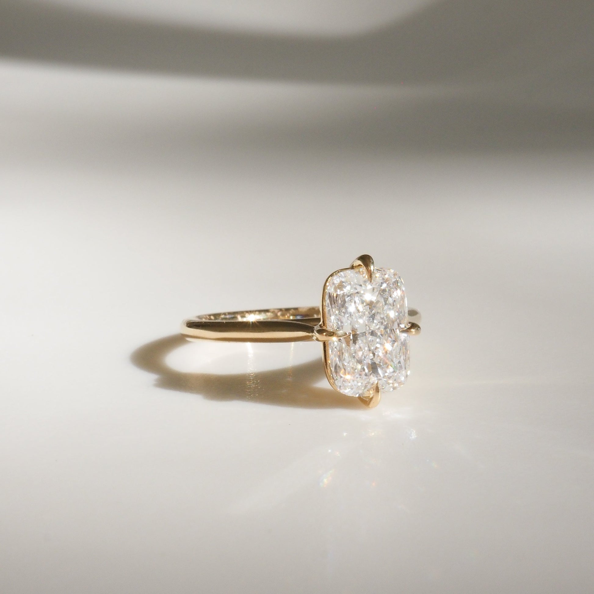 Solitaire Cathedral-Elongated Cushion Compass Prong Lab Grown Diamond Engagement Ring - On model