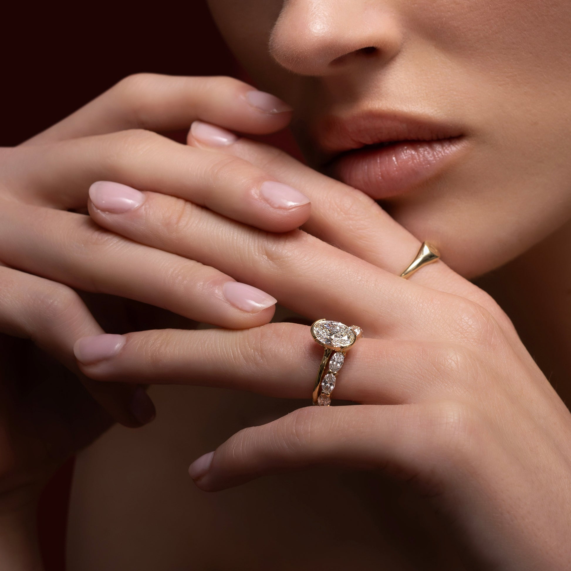 Solitaire Cathedral Half Bezel- 2.1 CT Oval Moissanite Engagement RingSolitaire Cathedral Half Bezel- 2.1 CT Oval Moissanite Engagement Ring - Side view