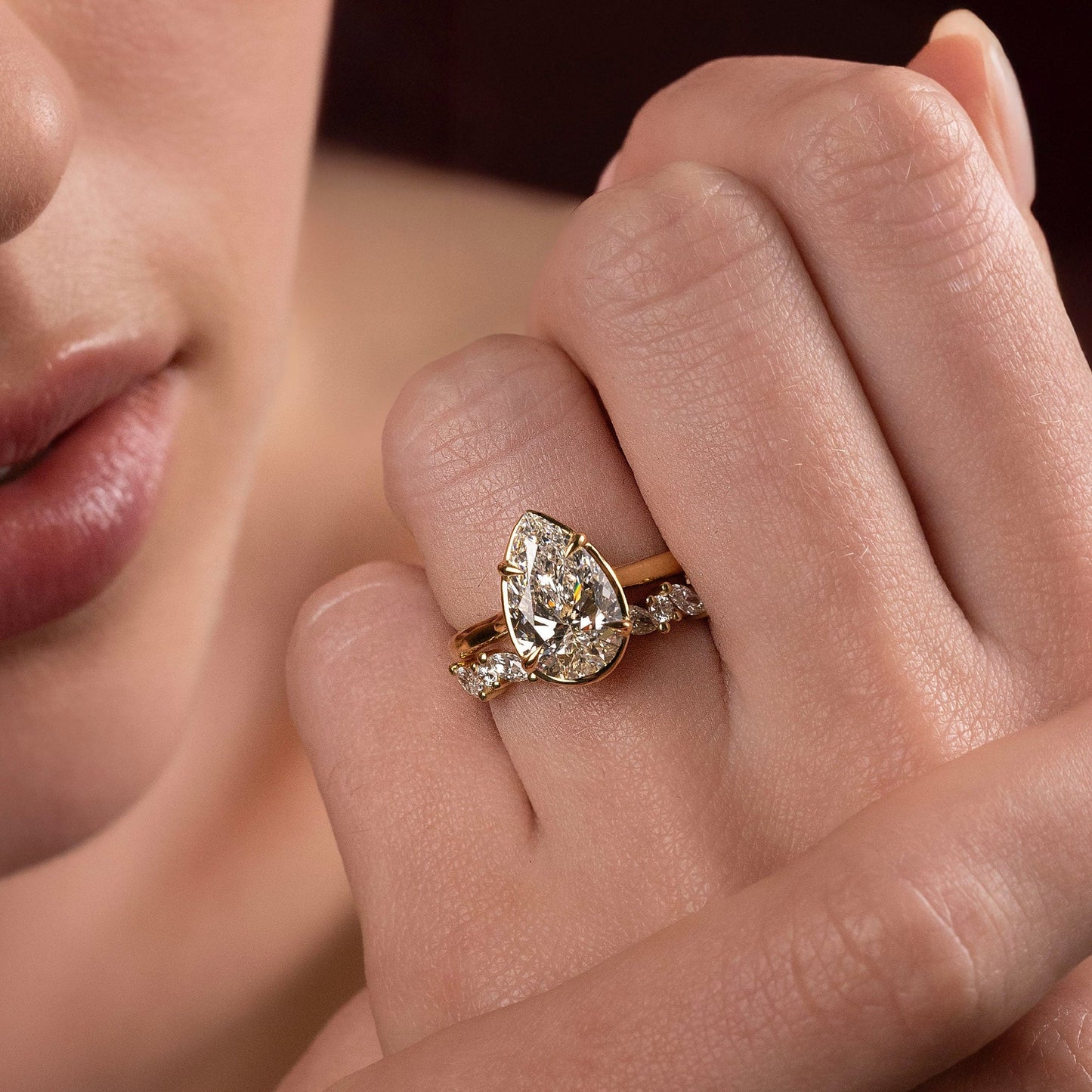 Solitaire Cathedral Unique Bezel- 1.9 CT Pear Moissanite Engagement RingSolitaire Cathedral Unique Bezel- 1.9 CT Pear Moissanite Engagement Ring - Side view