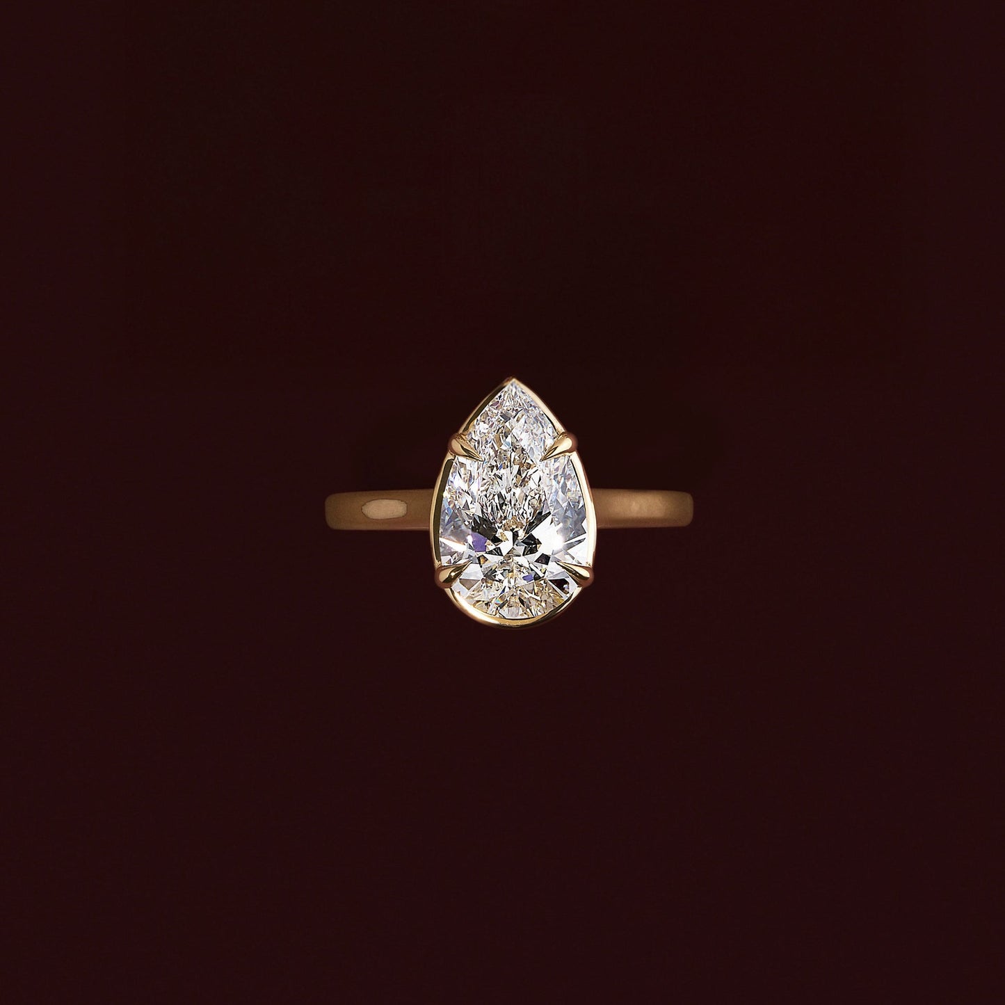 Solitaire Cathedral Unique Bezel- 1.9 CT Pear Moissanite Engagement RingSolitaire Cathedral Unique Bezel- 1.9 CT Pear Moissanite Engagement Ring - Back view
