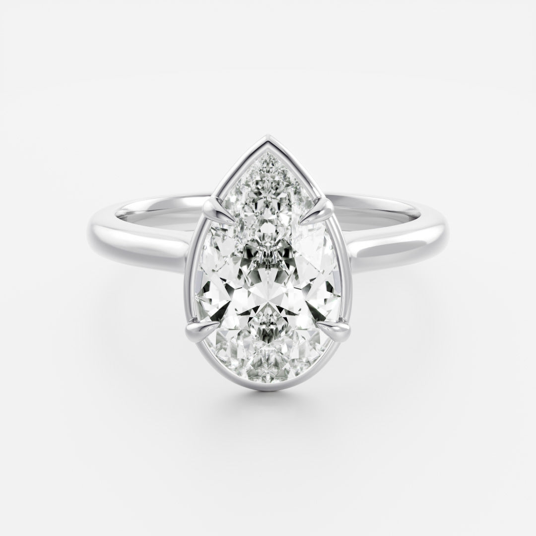Solitaire Cathedral Unique Bezel- 1.9 CT Pear Moissanite Engagement RingSolitaire Cathedral Unique Bezel- 1.9 CT Pear Moissanite Engagement Ring - Detail view