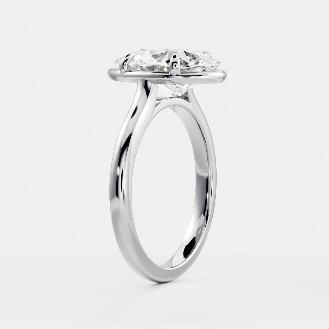 Solitaire Cathedral Unique Bezel- 1.9 CT Pear Moissanite Engagement RingSolitaire Cathedral Unique Bezel- 1.9 CT Pear Moissanite Engagement Ring - On model