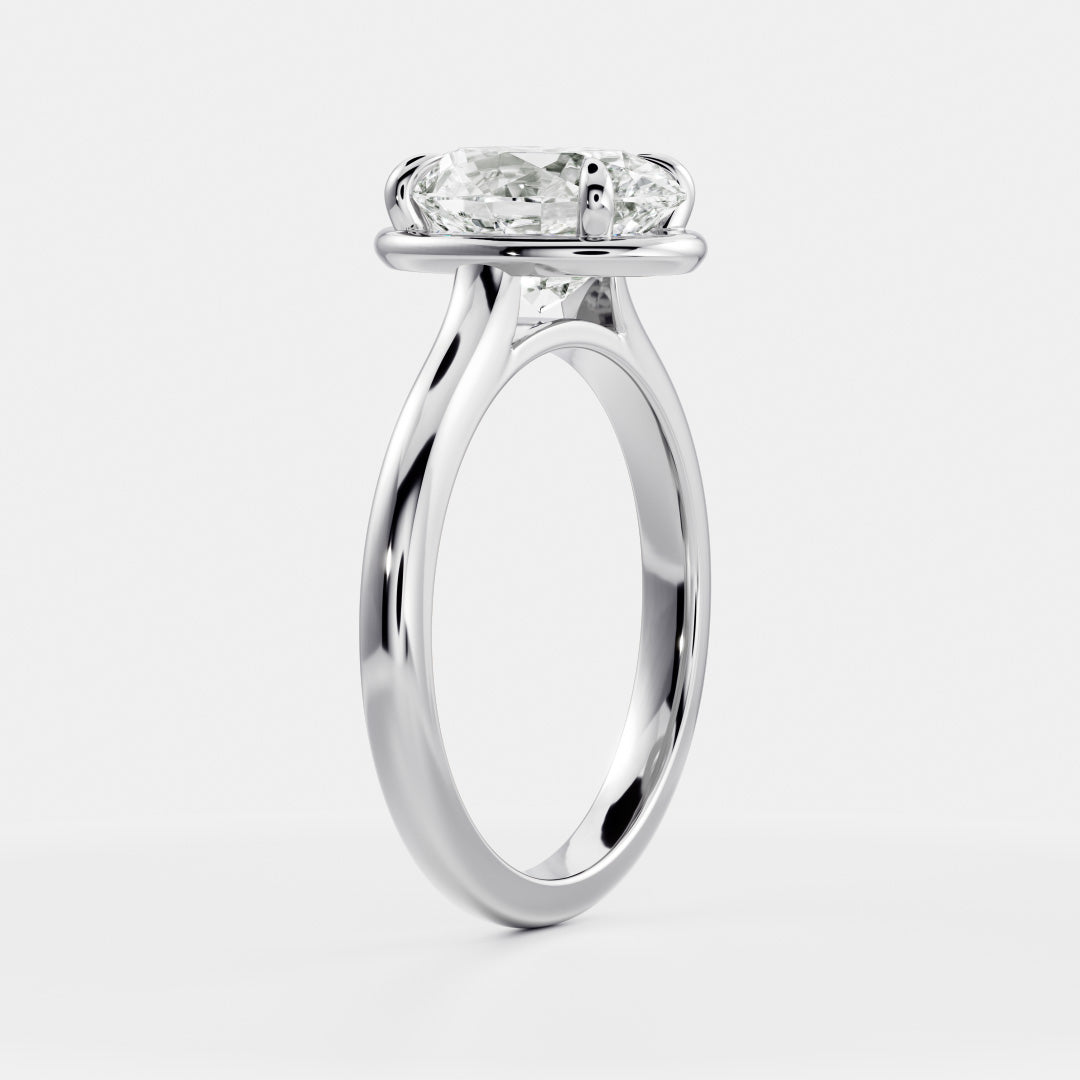 Solitaire Cathedral Unique Bezel- 2.1 CT Oval Moissanite Engagement RingSolitaire Cathedral Unique Bezel- 2.1 CT Oval Moissanite Engagement Ring - On model