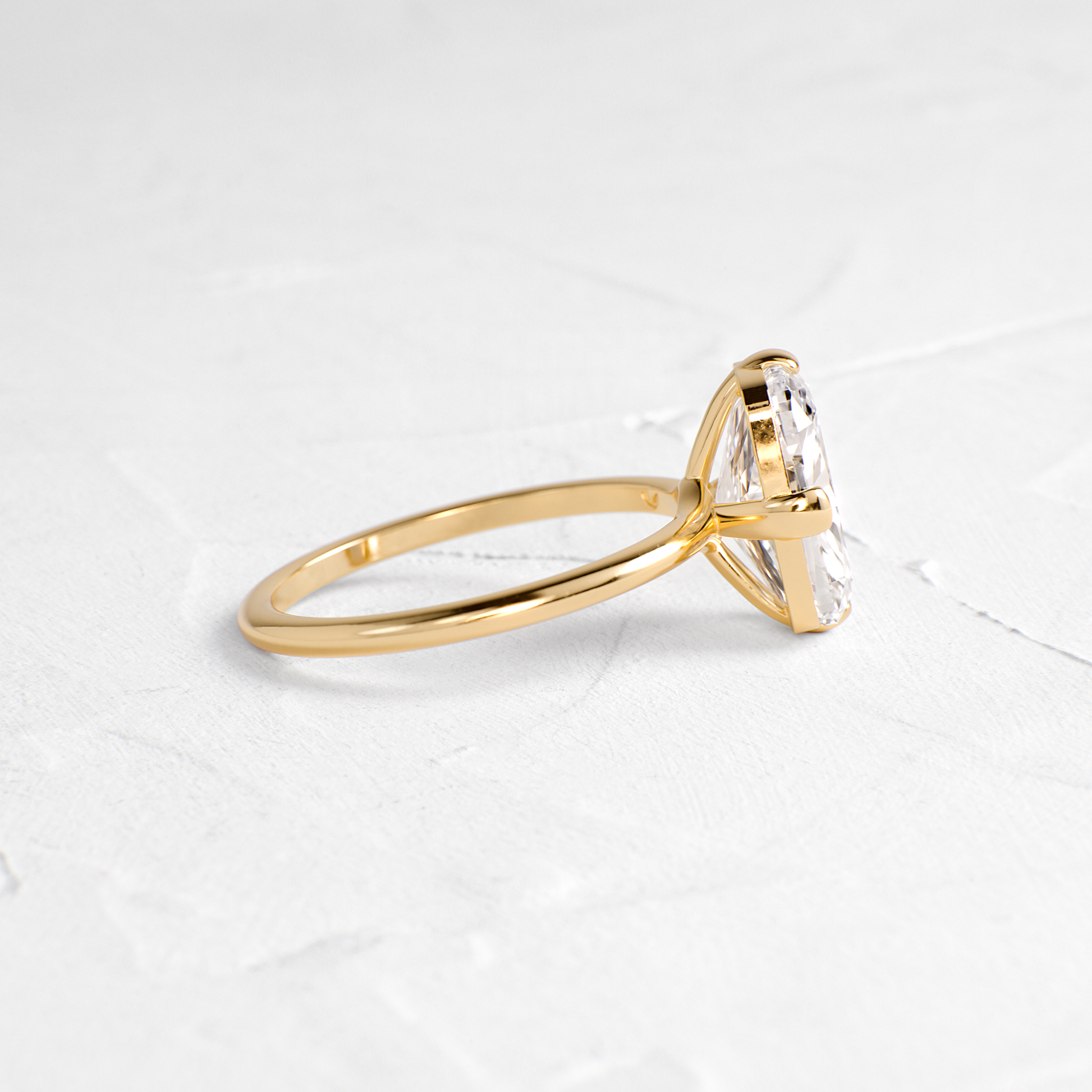 Solitaire Compass Prong-Elongated Cushion Lab Grown Diamond Engagement Ring - Side view