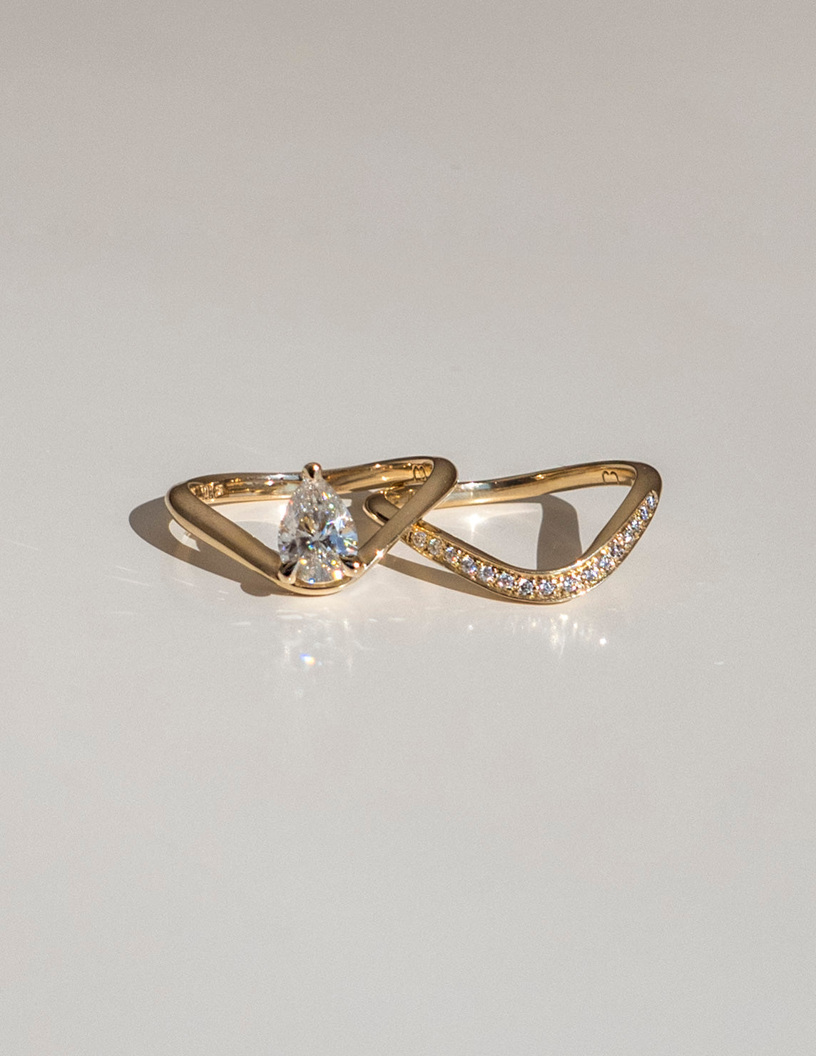 Solitaire Curve & Pave Band-1 CT Pear Lab Grown Diamond Bridal SetSolitaire Curve & Pave Band-1 CT Pear Lab Grown Diamond Bridal Set - Side view