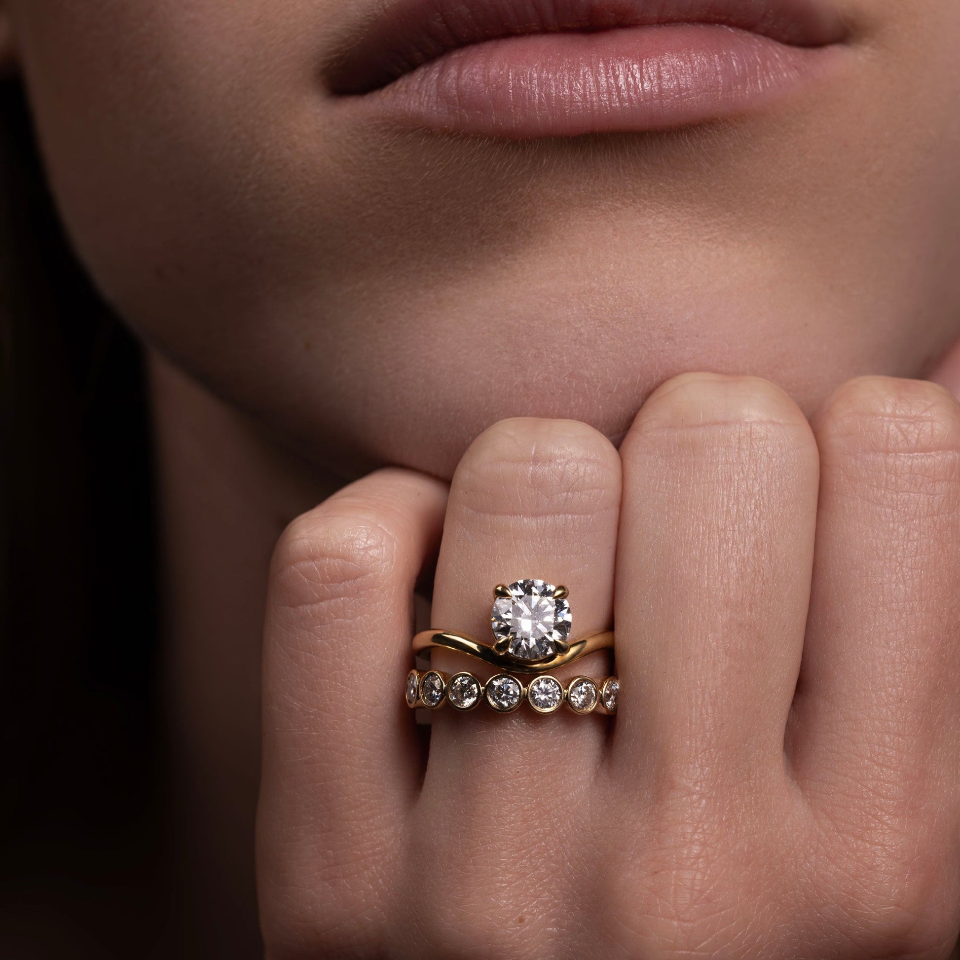 Solitaire Curved- 1.8 CT Round Moissanite Engagement RingSolitaire Curved- 1.8 CT Round Moissanite Engagement Ring - Side view