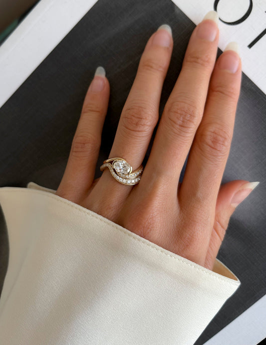 Solitaire Half Bezel Rapture & Pave Band- 1 CT Oval Lab Grown Diamond Bridal SetSolitaire Half Bezel Rapture & Pave Band- 1 CT Oval Lab Grown Diamond Bridal Set - Front view