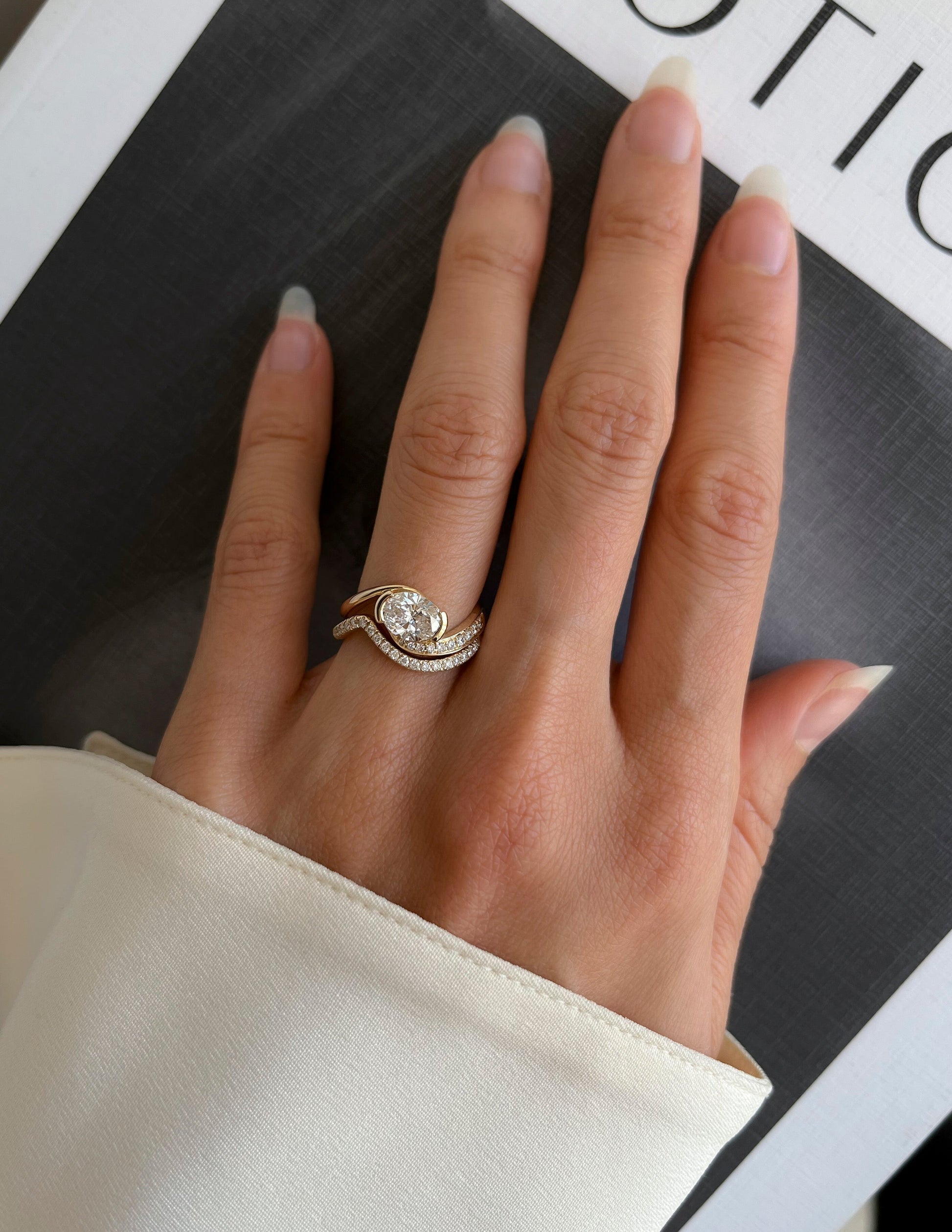 Solitaire Half Bezel Rapture & Pave Band- 1 CT Oval Lab Grown Diamond Bridal SetSolitaire Half Bezel Rapture & Pave Band- 1 CT Oval Lab Grown Diamond Bridal Set - Front view