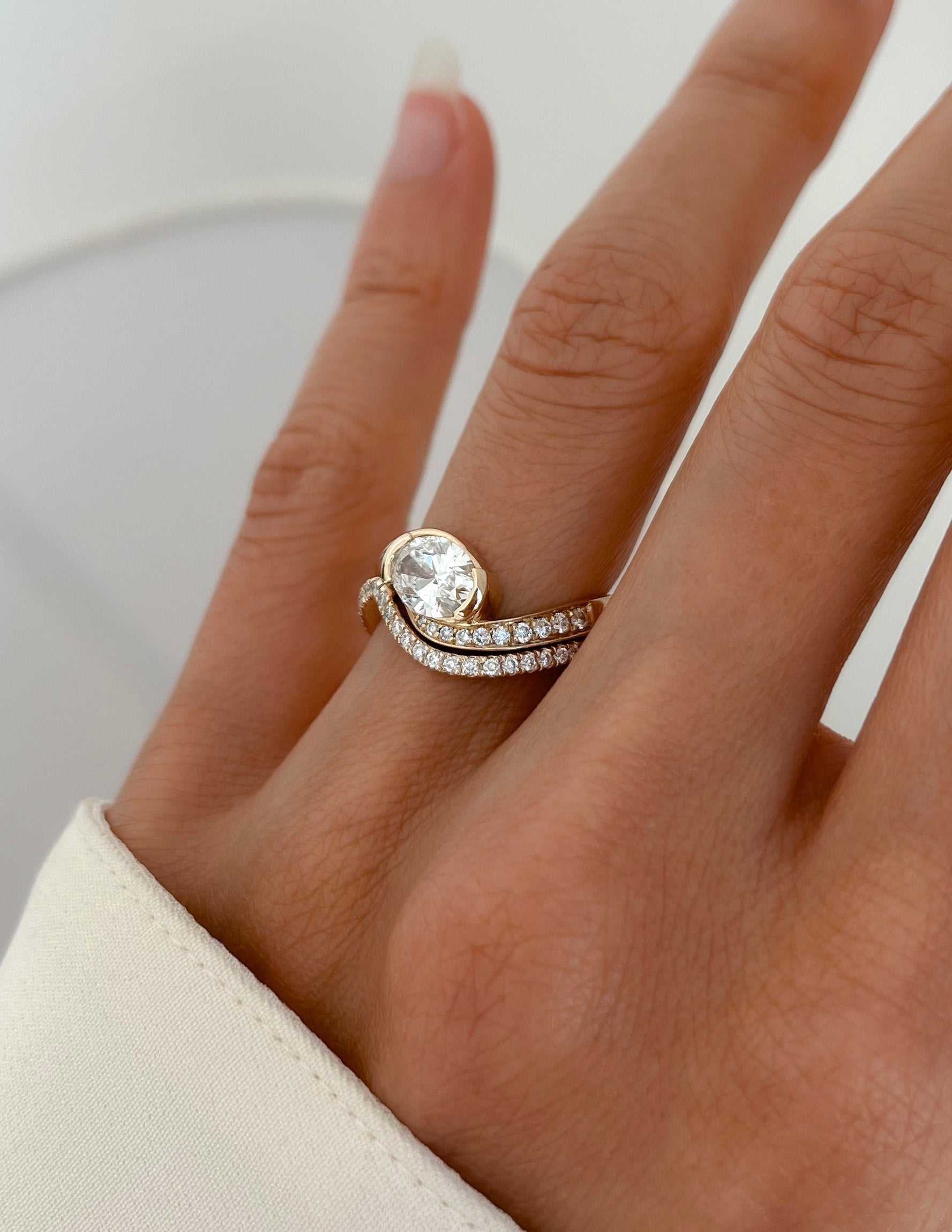 Solitaire Half Bezel Rapture & Pave Band- 1 CT Oval Lab Grown Diamond Bridal SetSolitaire Half Bezel Rapture & Pave Band- 1 CT Oval Lab Grown Diamond Bridal Set - Back view