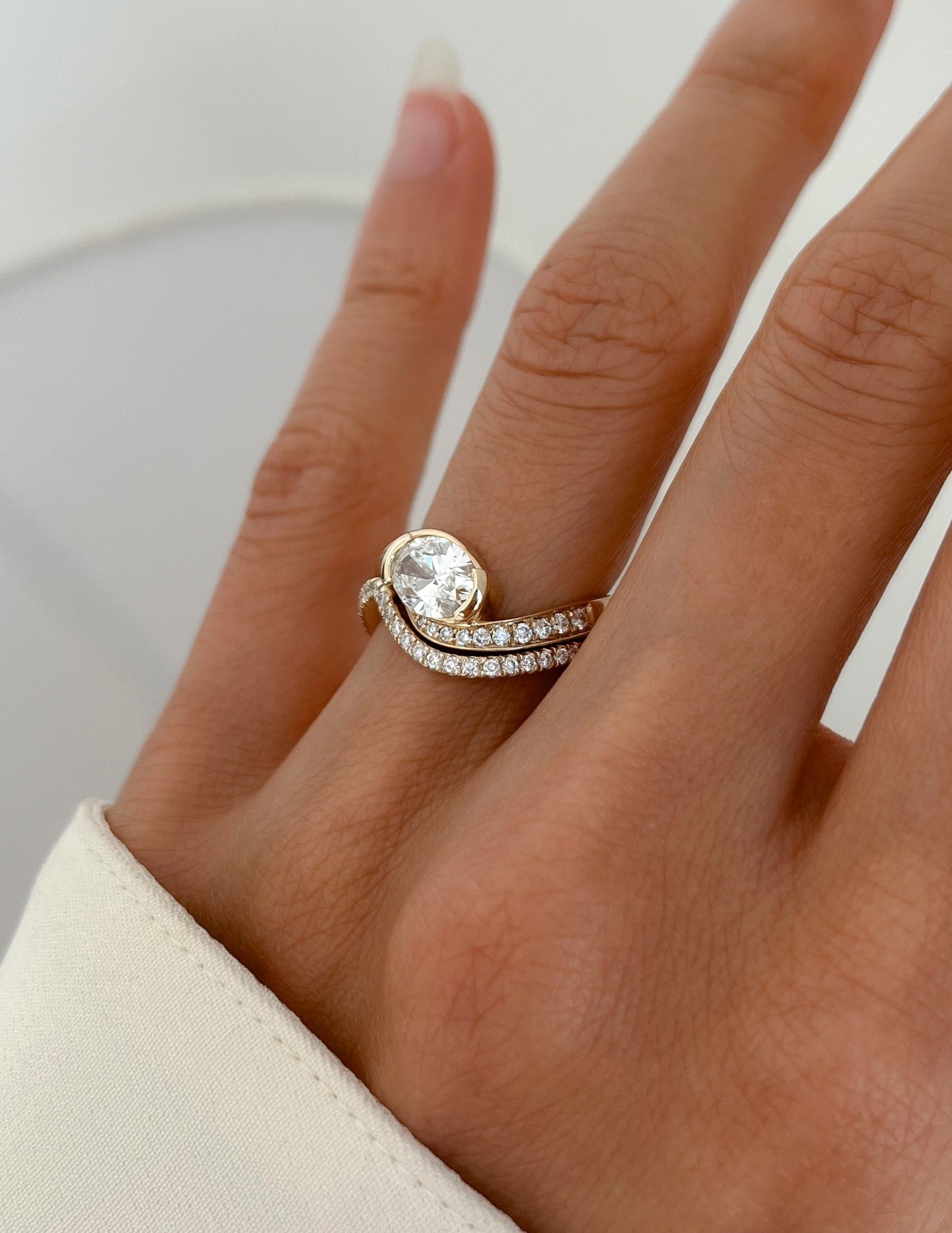 Solitaire Half Bezel Rapture & Pave Band- 1 CT Oval Lab Grown Diamond Bridal SetSolitaire Half Bezel Rapture & Pave Band- 1 CT Oval Lab Grown Diamond Bridal Set - Back view