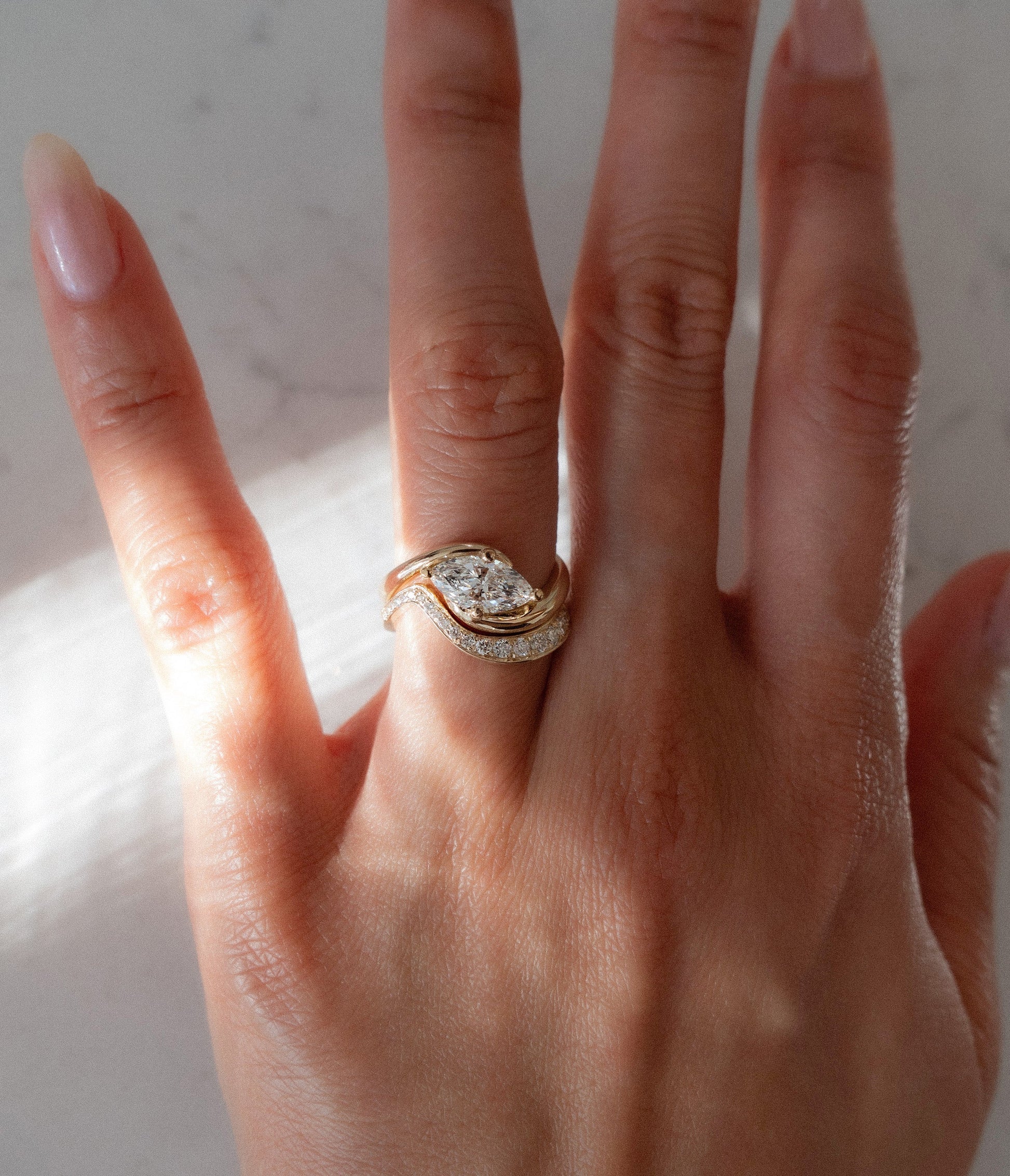 Solitaire Rapture Compass Prong & Pave Band- 1.5 CT Marquise Lab Grown Diamond Bridal SetSolitaire Rapture Compass Prong & Pave Band- 1.5 CT Marquise Lab Grown Diamond Bridal Set - Lifestyle