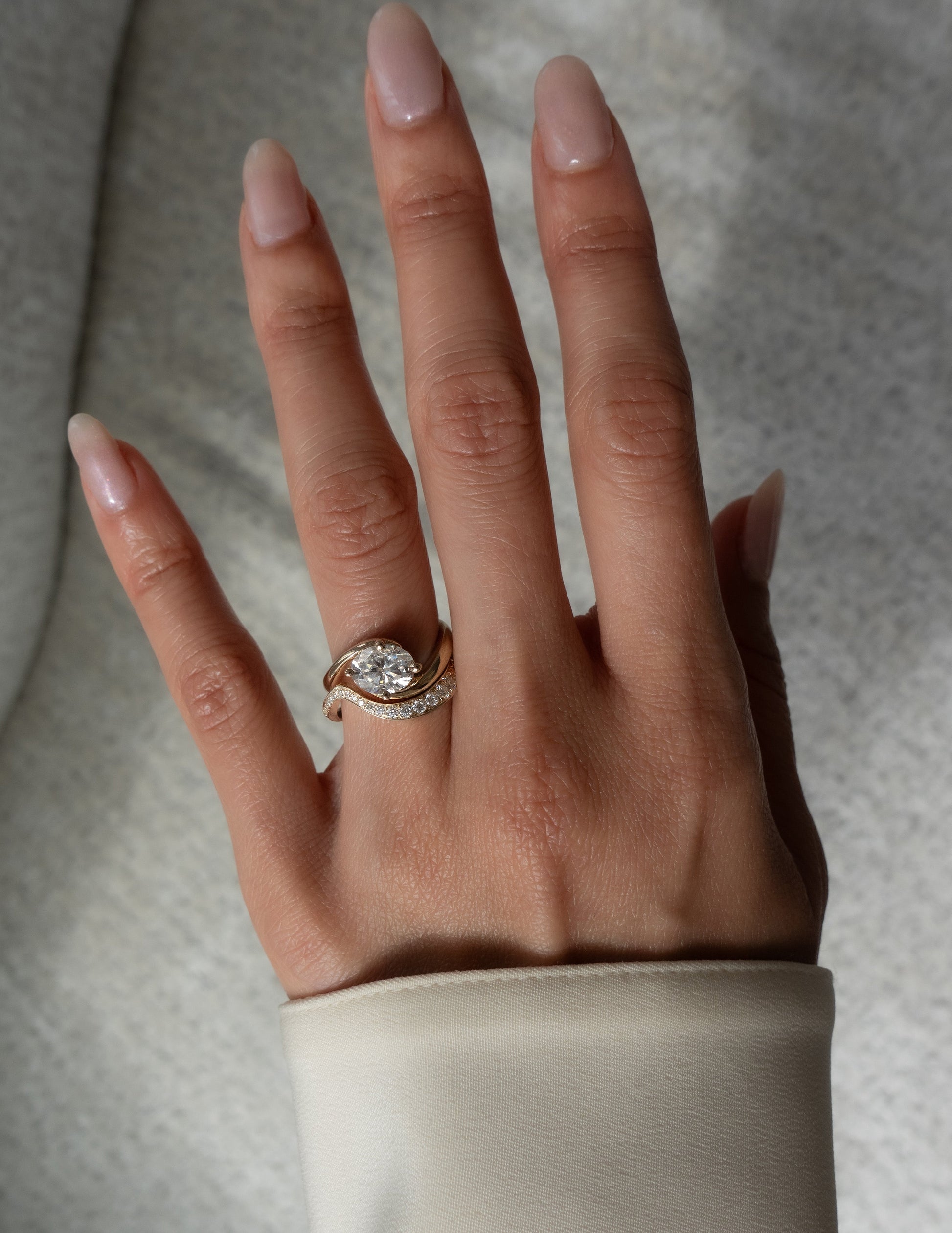 Solitaire Rapture Compass Prong & Pave Band- 1 CT Oval Lab Grown Diamond Bridal SetSolitaire Rapture Compass Prong & Pave Band- 1 CT Oval Lab Grown Diamond Bridal Set - Detail view