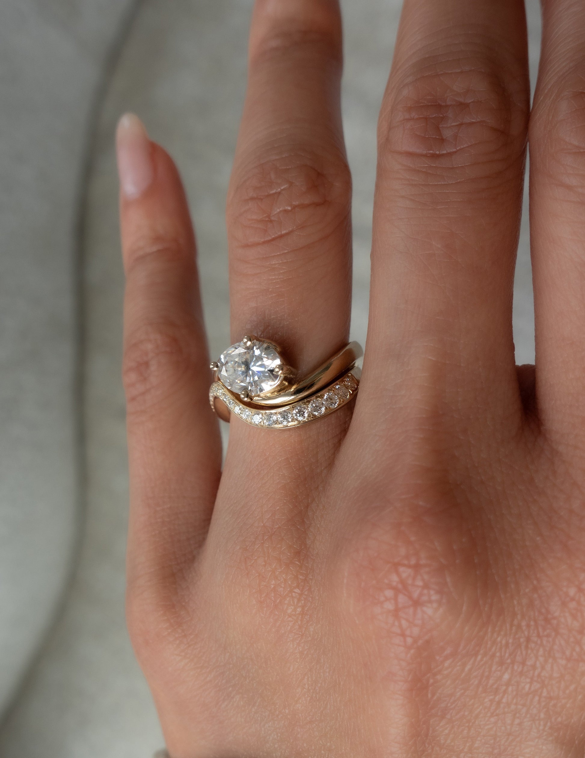 Solitaire Rapture Compass Prong & Pave Band- 1 CT Oval Lab Grown Diamond Bridal SetSolitaire Rapture Compass Prong & Pave Band- 1 CT Oval Lab Grown Diamond Bridal Set - On model