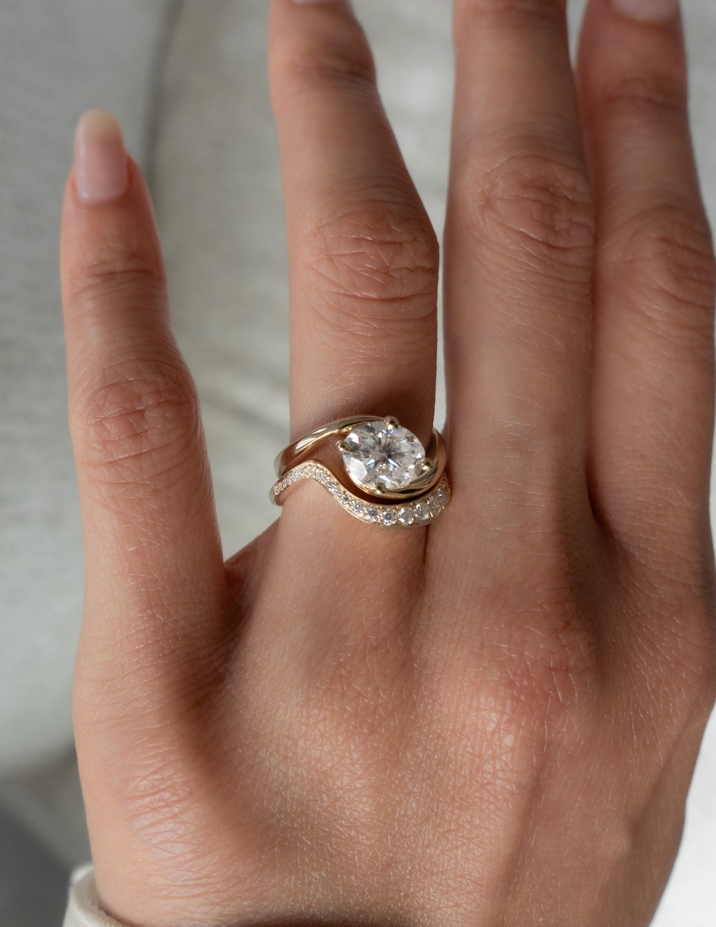Solitaire Rapture Compass Prong & Pave Band- 1 CT Oval Lab Grown Diamond Bridal SetSolitaire Rapture Compass Prong & Pave Band- 1 CT Oval Lab Grown Diamond Bridal Set - Side view