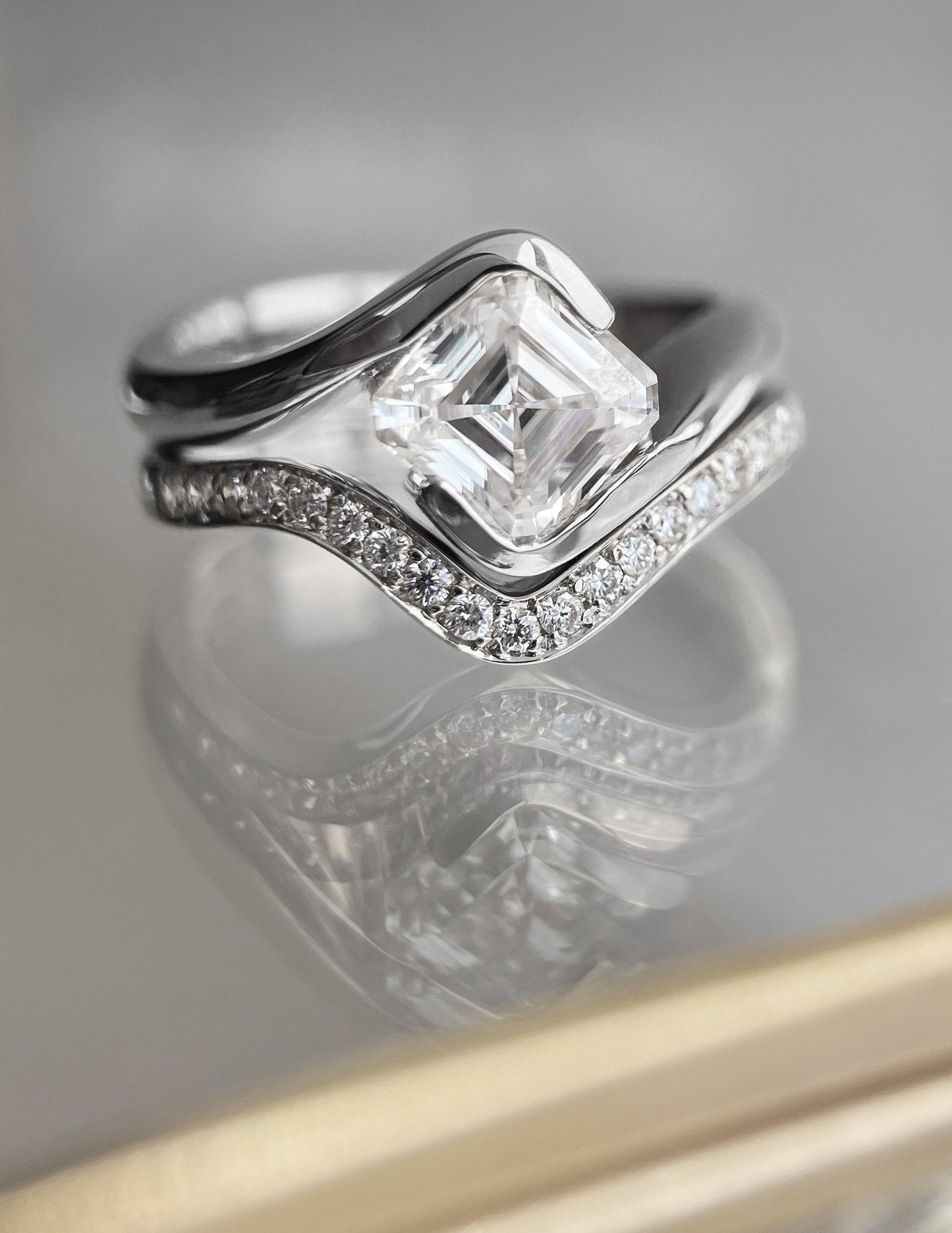 Solitaire Rapture Half Bezel & Pave Band- 1.5 CT Asscher Lab Grown Diamond Bridal SetSolitaire Rapture Half Bezel & Pave Band- 1.5 CT Asscher Lab Grown Diamond Bridal Set - Back view