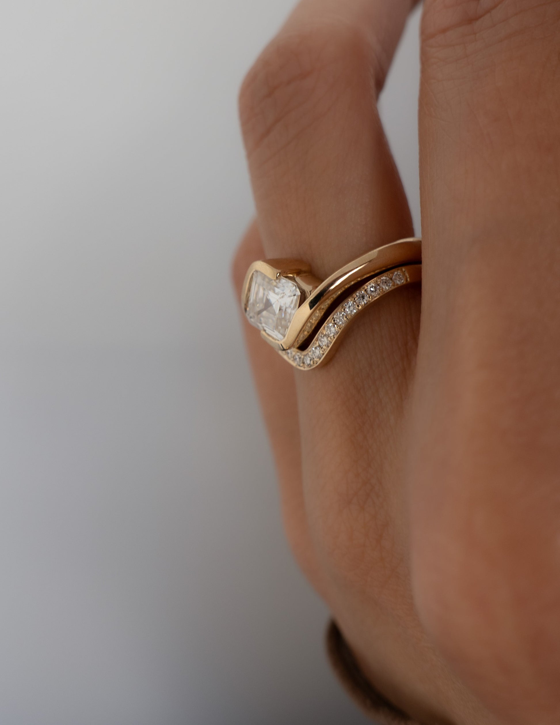 Solitaire Rapture Half Bezel & Pave Band- 1.5 CT Asscher Lab Grown Diamond Bridal SetSolitaire Rapture Half Bezel & Pave Band- 1.5 CT Asscher Lab Grown Diamond Bridal Set - Back view