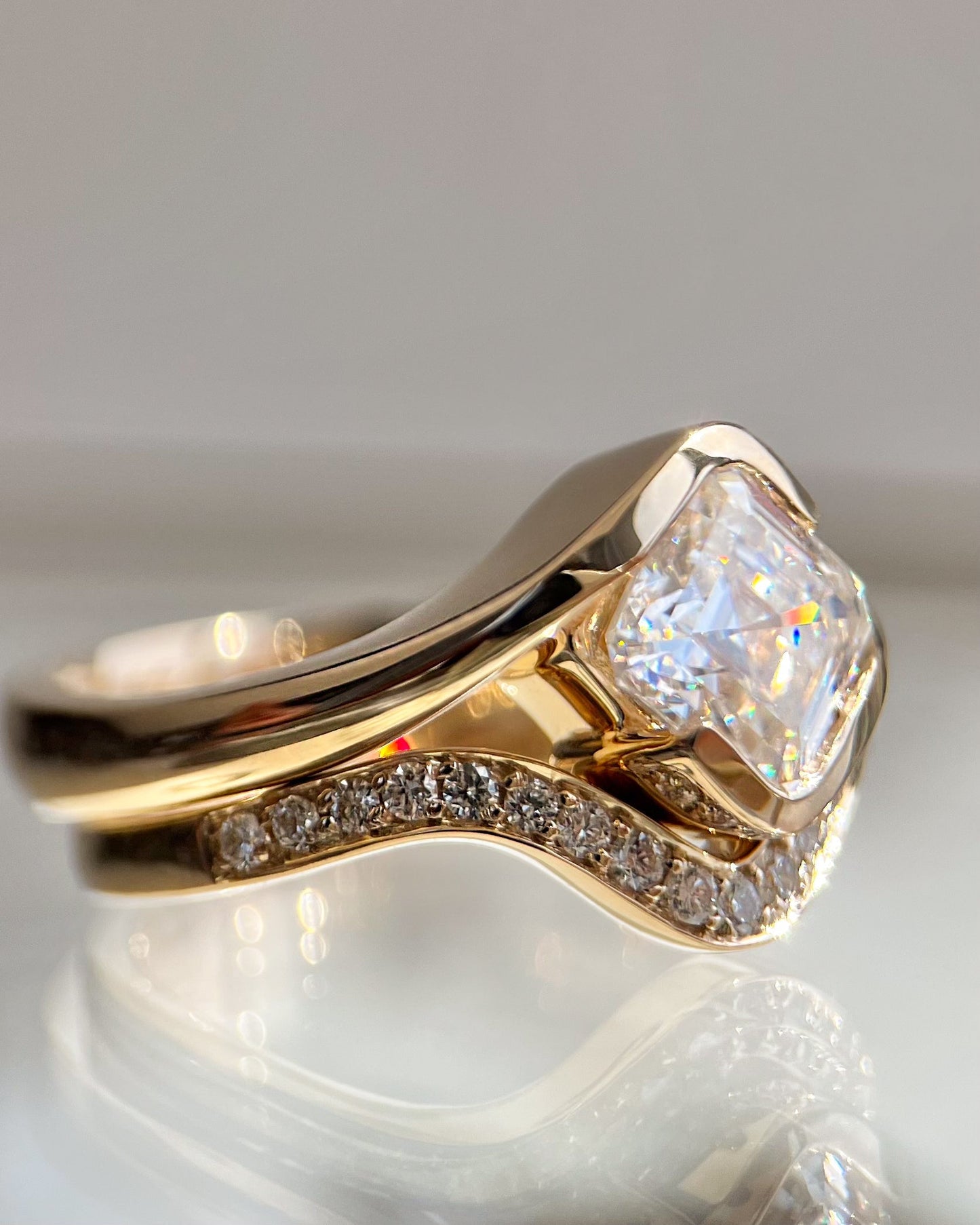 Solitaire Rapture Half Bezel & Pave Band- 1.5 CT Asscher Lab Grown Diamond Bridal SetSolitaire Rapture Half Bezel & Pave Band- 1.5 CT Asscher Lab Grown Diamond Bridal Set - Detail view