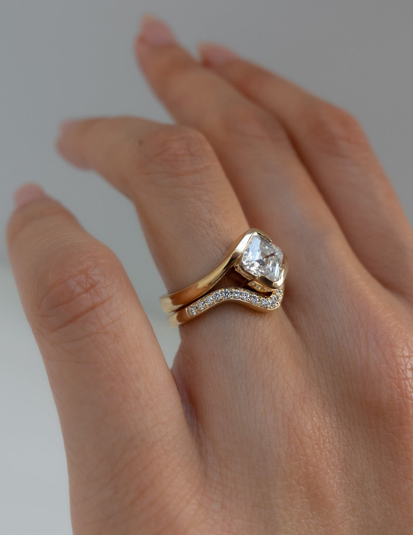 Solitaire Rapture Half Bezel & Pave Band- 1.5 CT Asscher Lab Grown Diamond Bridal SetSolitaire Rapture Half Bezel & Pave Band- 1.5 CT Asscher Lab Grown Diamond Bridal Set - Lifestyle