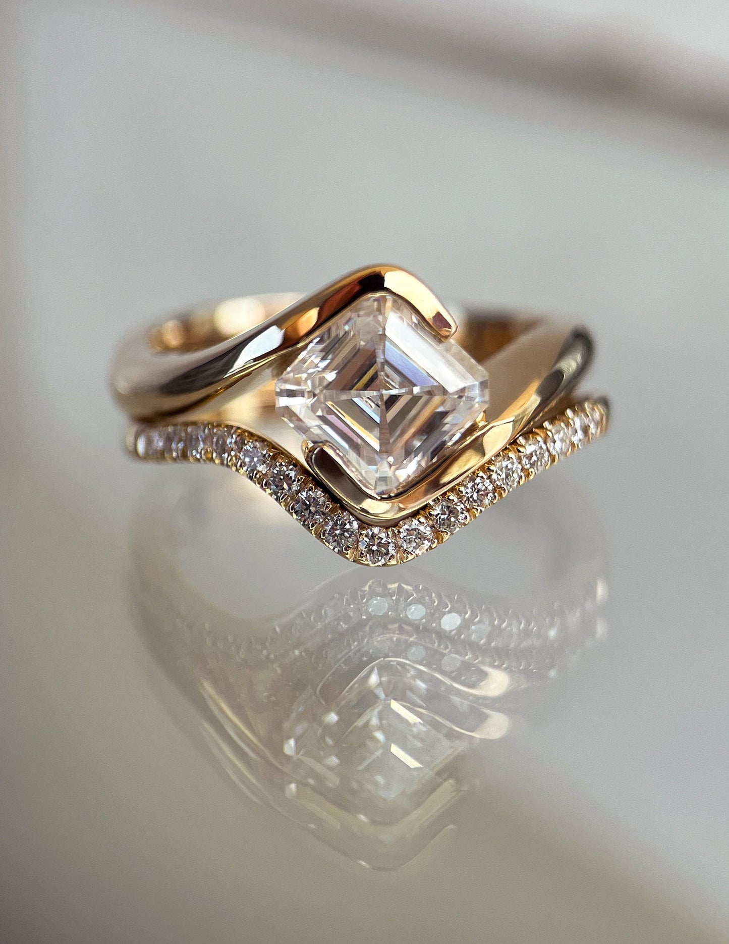 Solitaire Rapture Half Bezel & Pave Band- 1.5 CT Asscher Lab Grown Diamond Bridal SetSolitaire Rapture Half Bezel & Pave Band- 1.5 CT Asscher Lab Grown Diamond Bridal Set - Side view