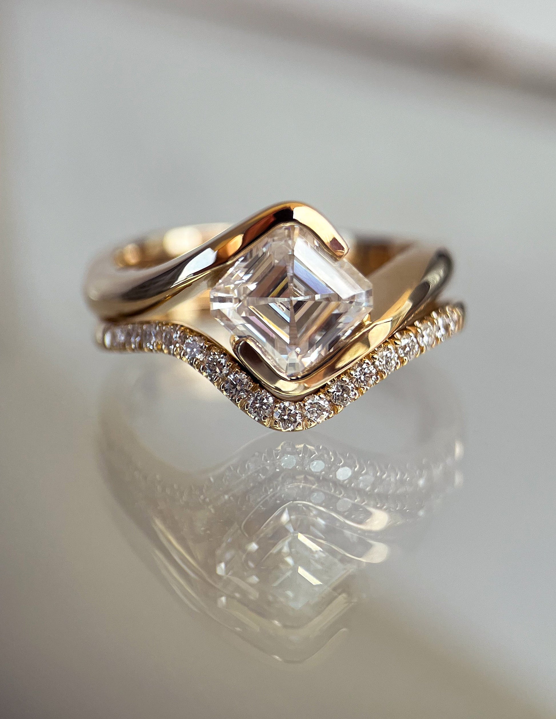 Solitaire Rapture Half Bezel & Pave Band- 1.5 CT Asscher Lab Grown Diamond Bridal SetSolitaire Rapture Half Bezel & Pave Band- 1.5 CT Asscher Lab Grown Diamond Bridal Set - Side view