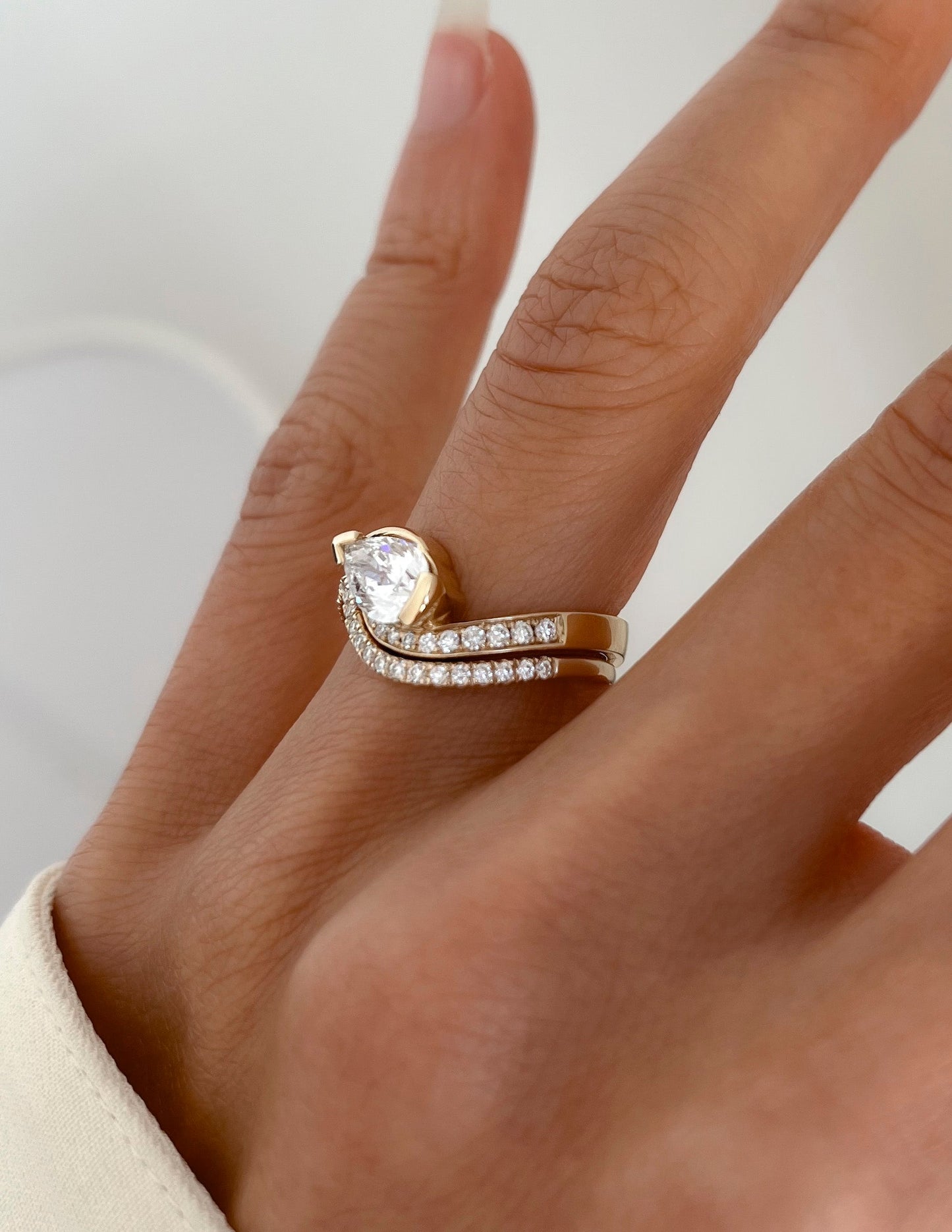 Solitaire Rapture & Pave Band- 1 CT Pear Lab Grown Diamond Bridal SetSolitaire Rapture & Pave Band- 1 CT Pear Lab Grown Diamond Bridal Set - Side view