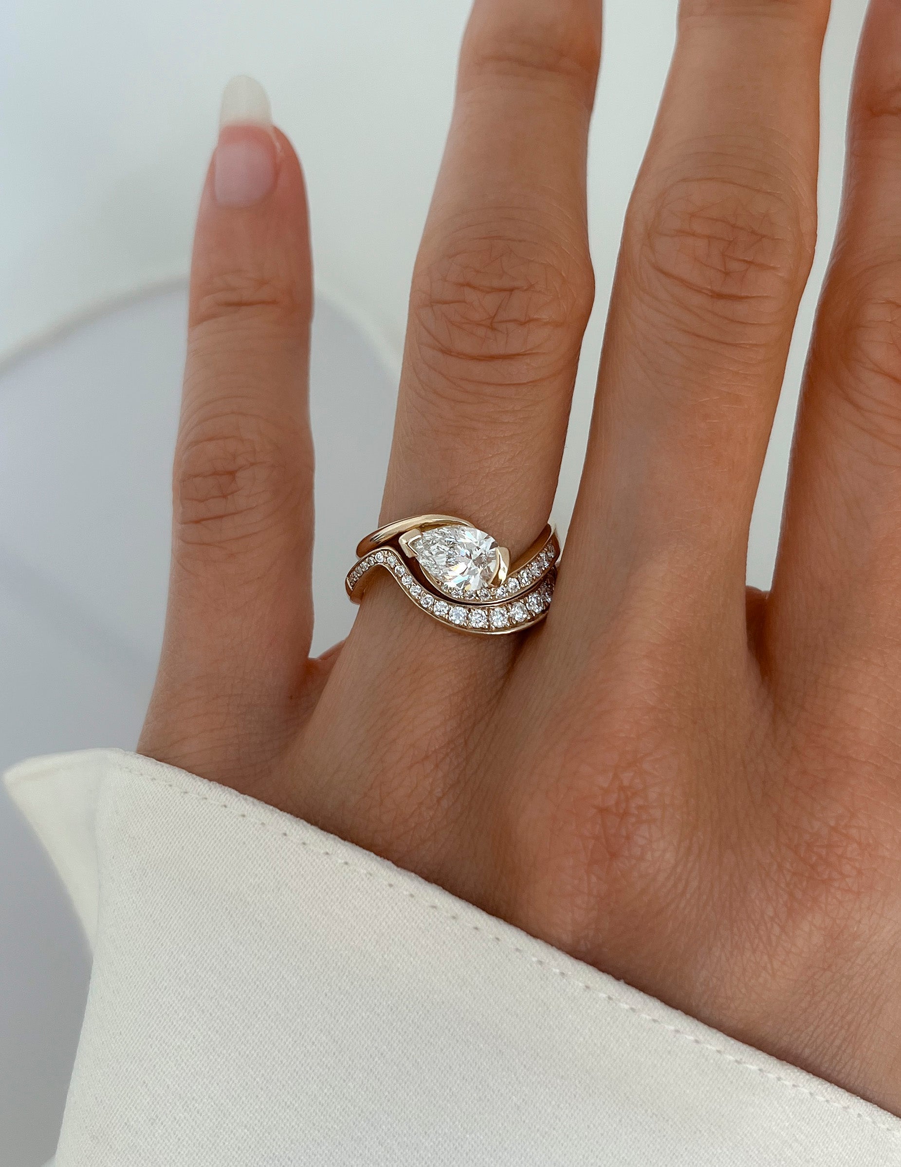 Solitaire Rapture & Pave Band- 1 CT Pear Lab Grown Diamond Bridal SetSolitaire Rapture & Pave Band- 1 CT Pear Lab Grown Diamond Bridal Set - Detail view