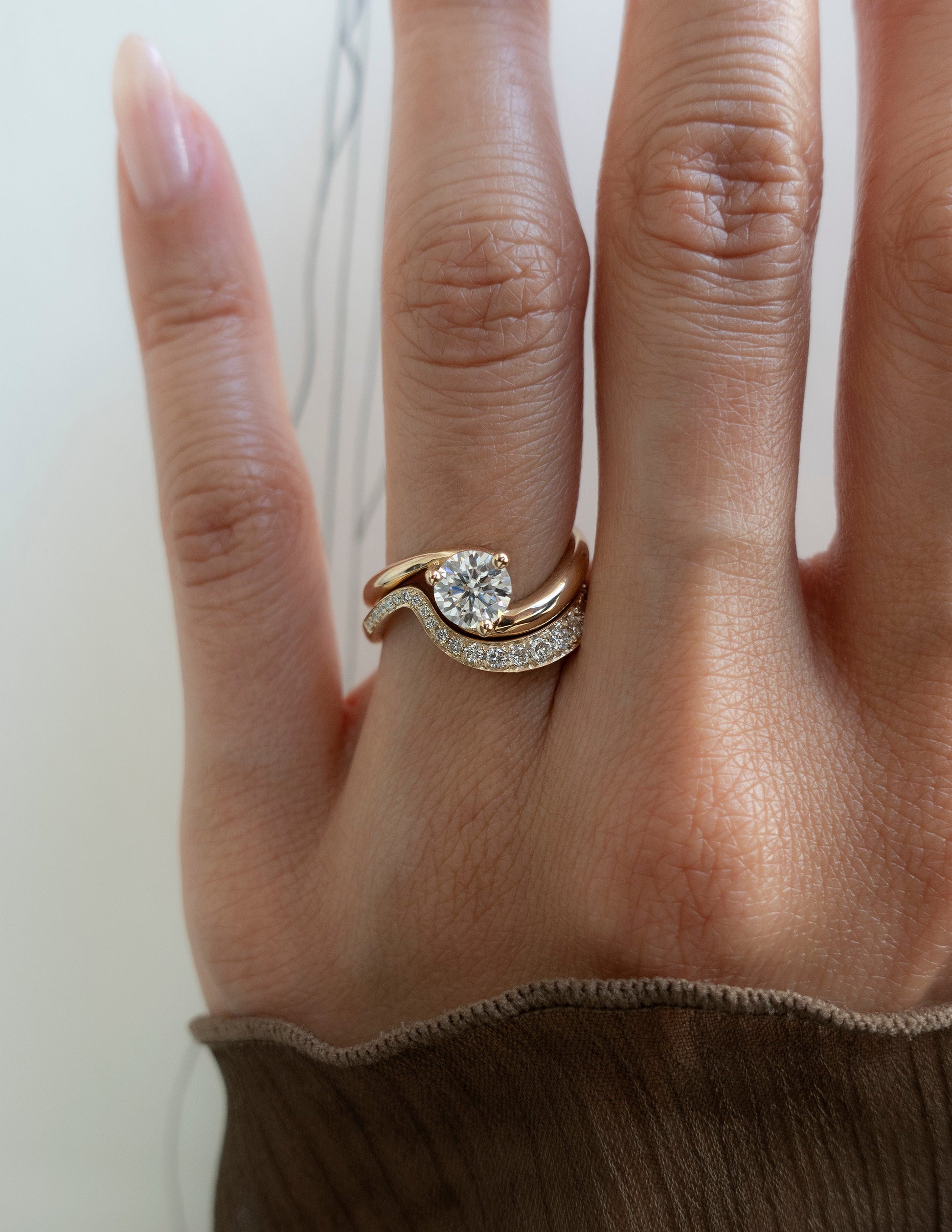 Solitaire Rapture & Pave Band- 1 CT Round Lab Grown Diamond Bridal SetSolitaire Rapture & Pave Band- 1 CT Round Lab Grown Diamond Bridal Set - On model