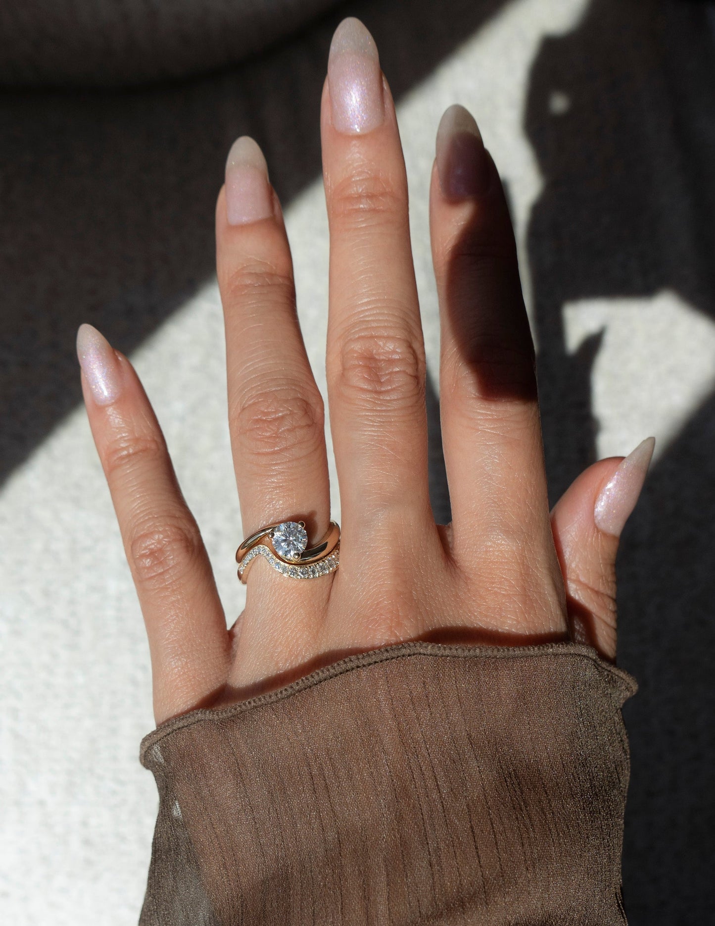 Solitaire Rapture & Pave Band- 1 CT Round Lab Grown Diamond Bridal SetSolitaire Rapture & Pave Band- 1 CT Round Lab Grown Diamond Bridal Set - On model