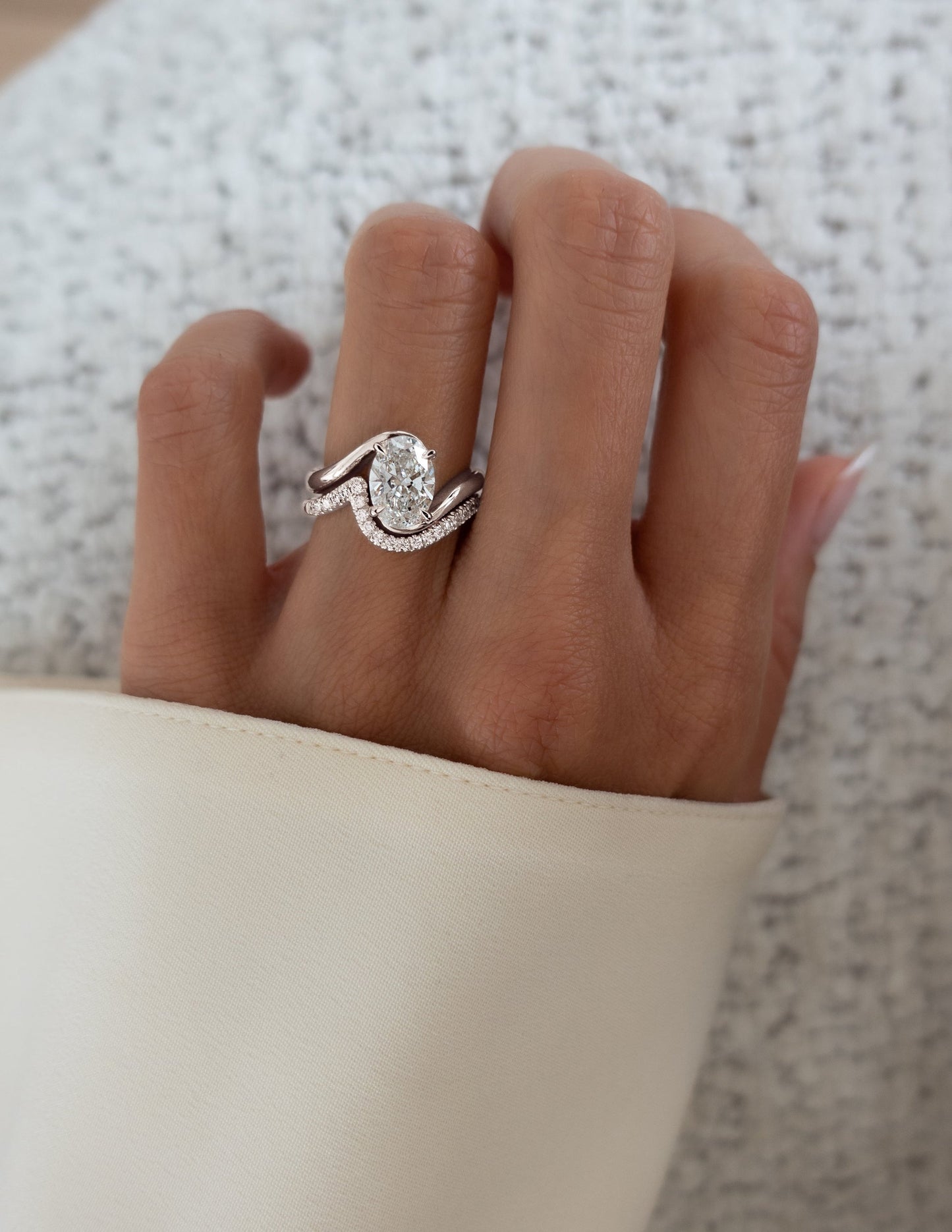 Solitaire Rapture & Pave Band- 2.5 CT Oval Lab Grown Diamond Bridal SetSolitaire Rapture & Pave Band- 2.5 CT Oval Lab Grown Diamond Bridal Set - On model