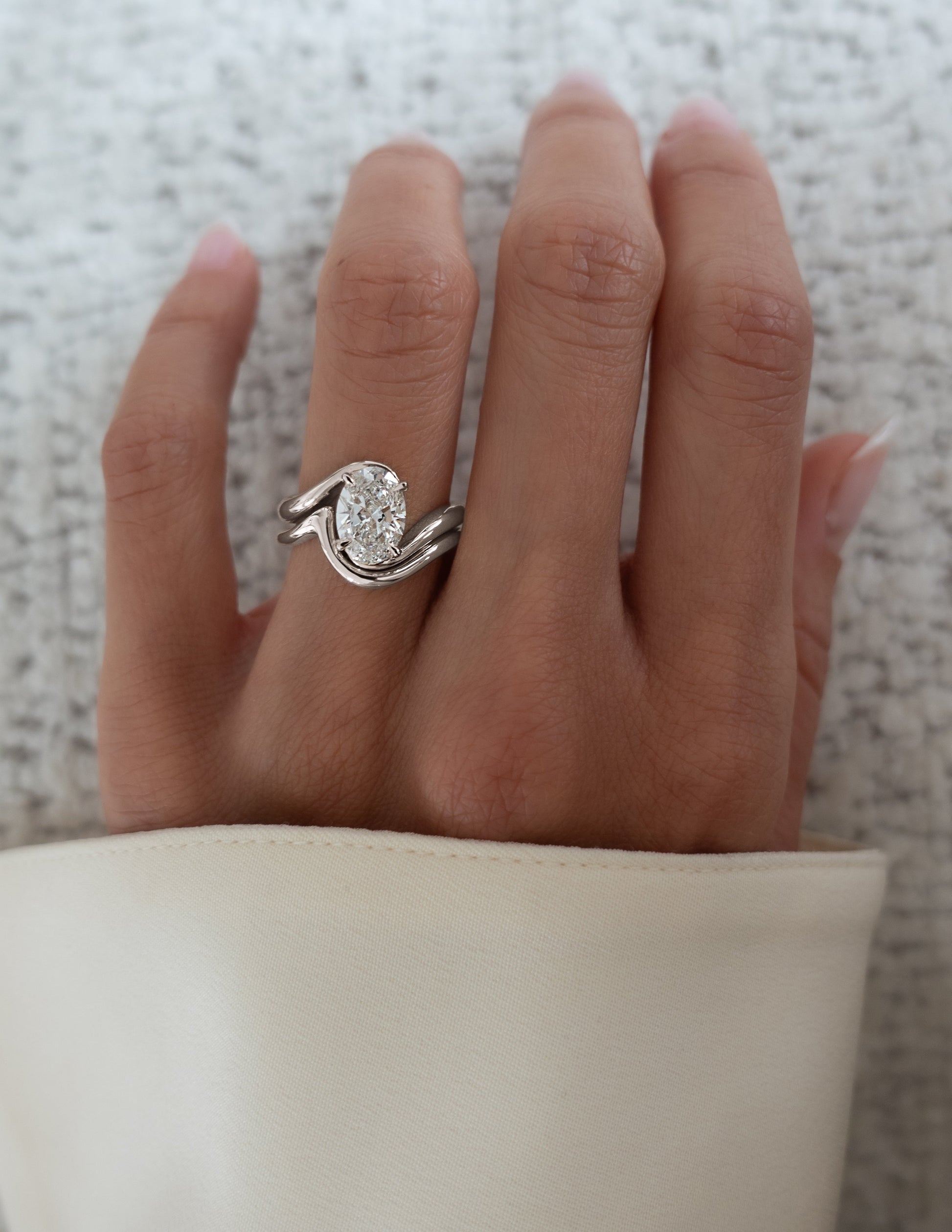 Solitaire Rapture & Pave Band- 2.5 CT Oval Lab Grown Diamond Bridal SetSolitaire Rapture & Pave Band- 2.5 CT Oval Lab Grown Diamond Bridal Set - On model