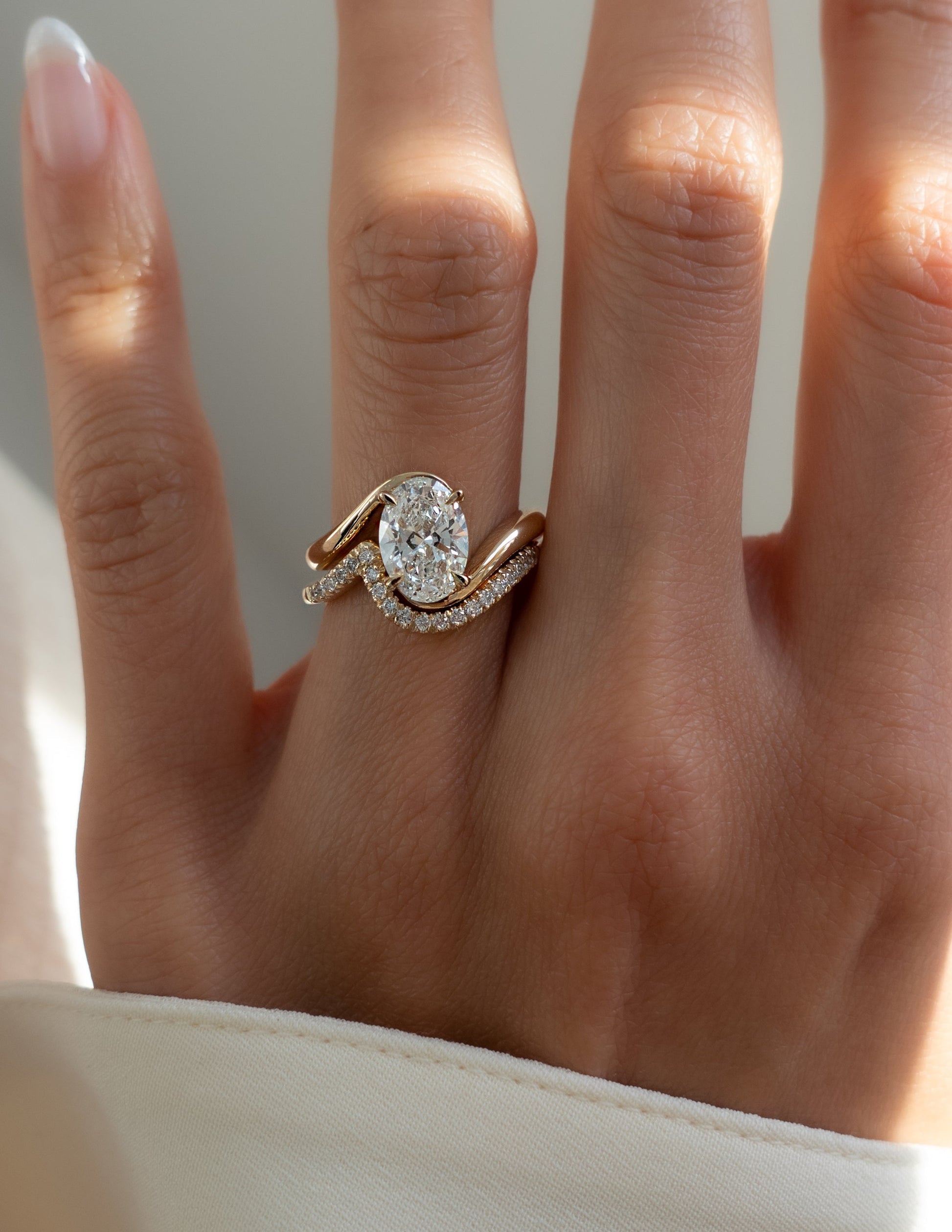 Solitaire Rapture & Pave Band- 2.5 CT Oval Lab Grown Diamond Bridal SetSolitaire Rapture & Pave Band- 2.5 CT Oval Lab Grown Diamond Bridal Set - Lifestyle
