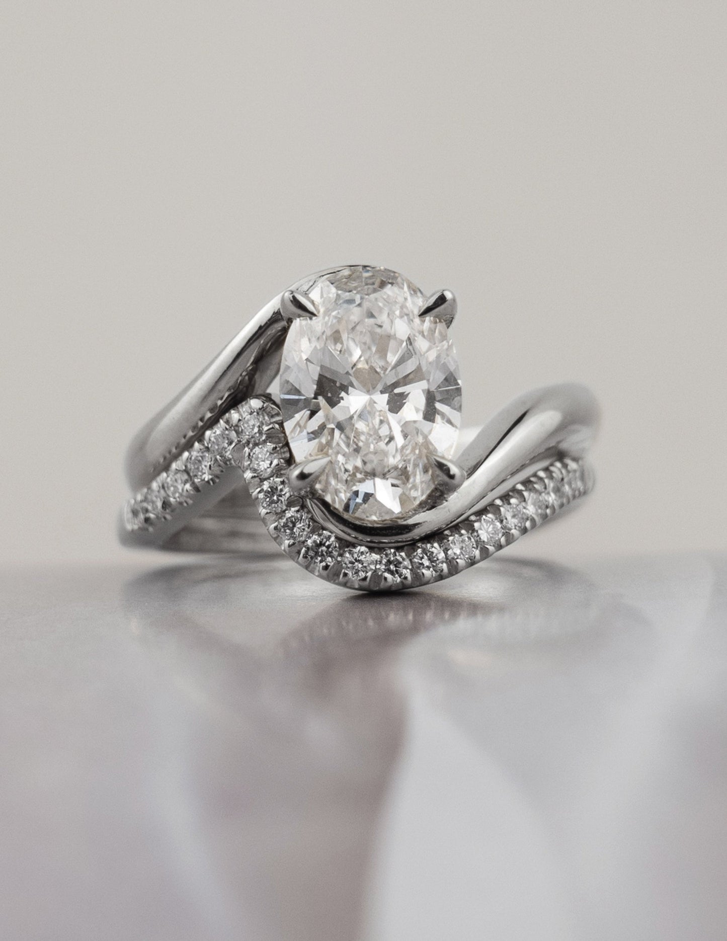 Solitaire Rapture & Pave Band- 2.5 CT Oval Lab Grown Diamond Bridal SetSolitaire Rapture & Pave Band- 2.5 CT Oval Lab Grown Diamond Bridal Set - Side view
