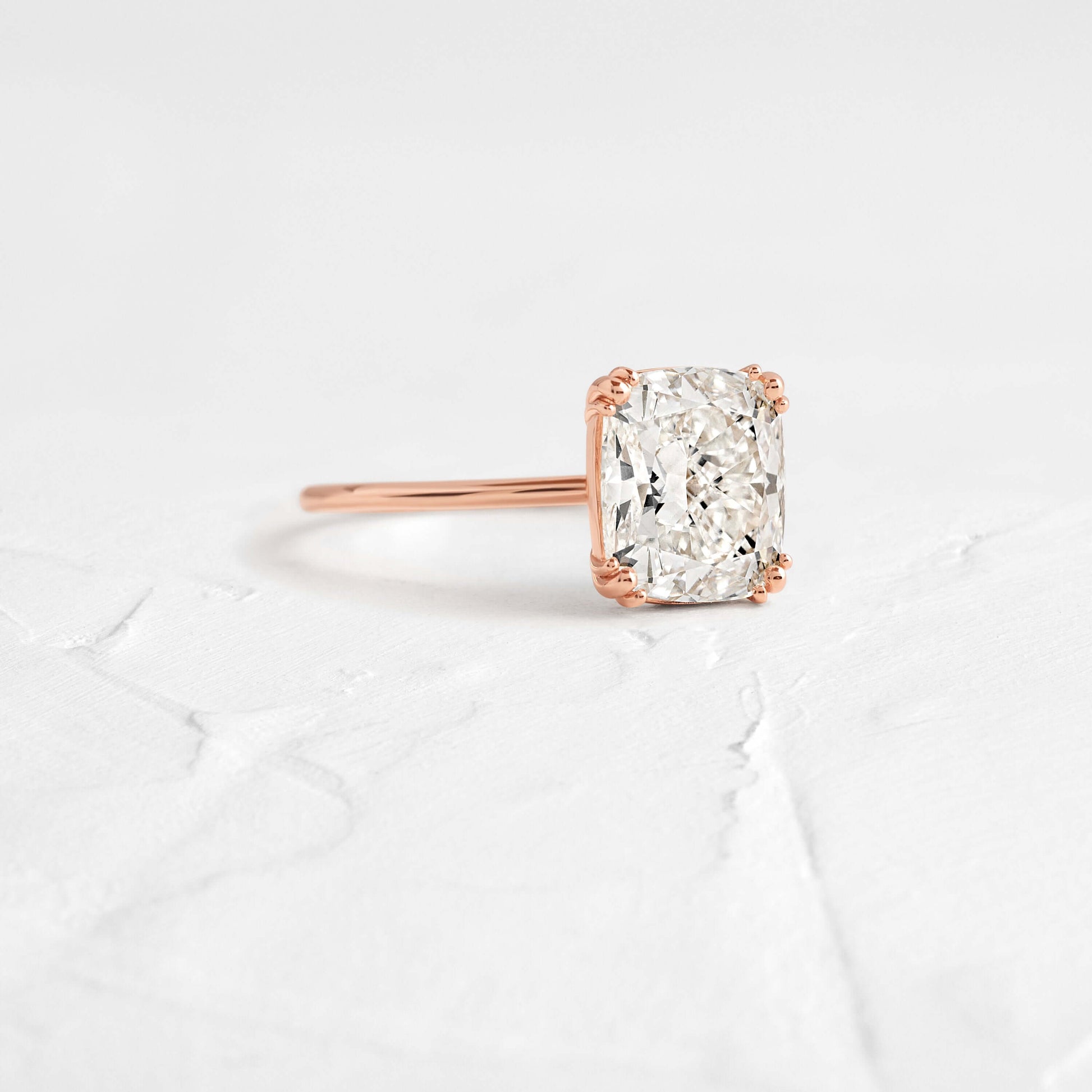 Solitaire Triple Prong-Elongated Cushion Lab Grown Diamond Engagement Ring - On model