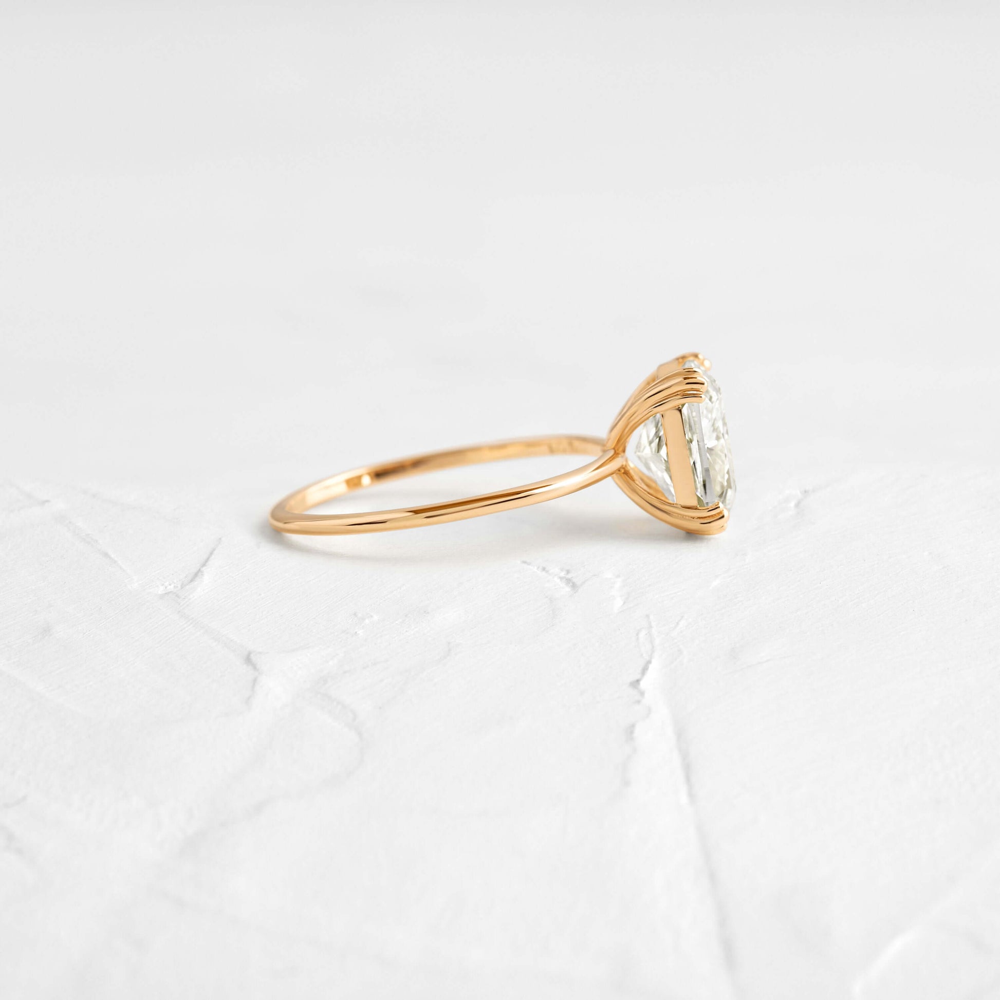 Solitaire Triple Prong-Elongated Cushion Lab Grown Diamond Engagement Ring - Side view