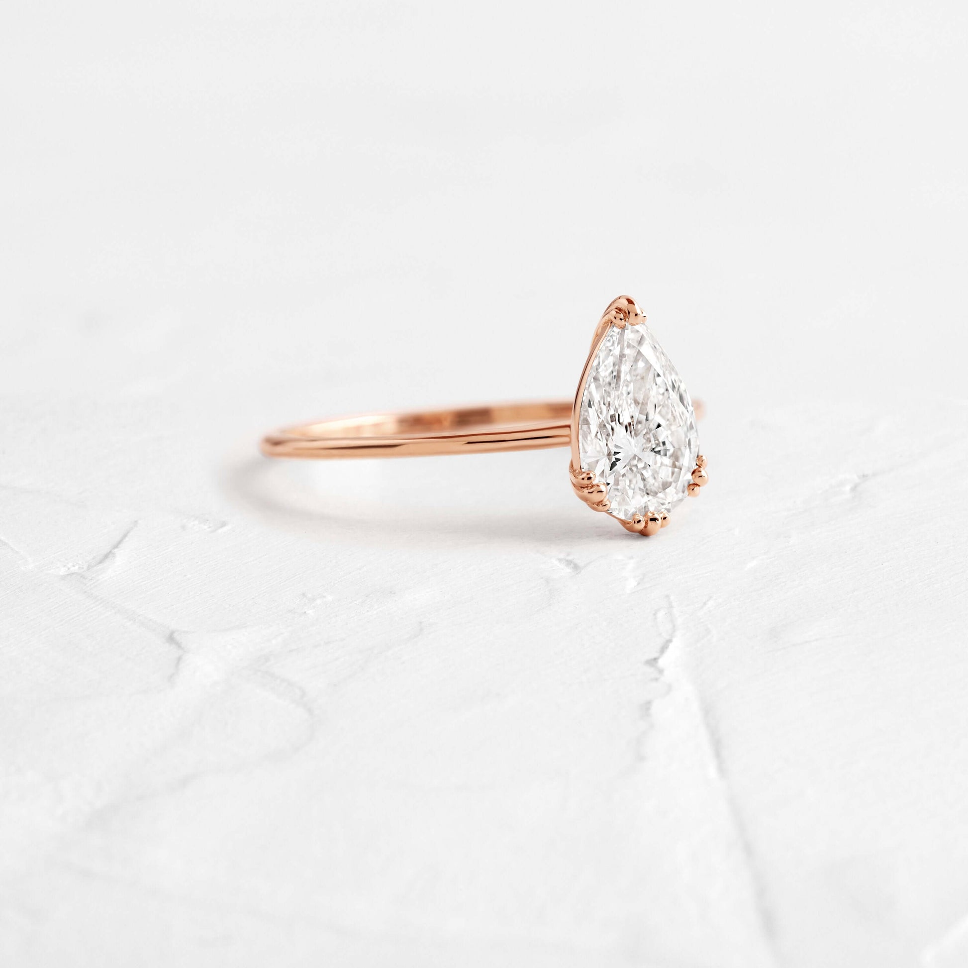 Solitaire Triple Prong-Pear Lab Grown Diamond Engagement Ring - On model