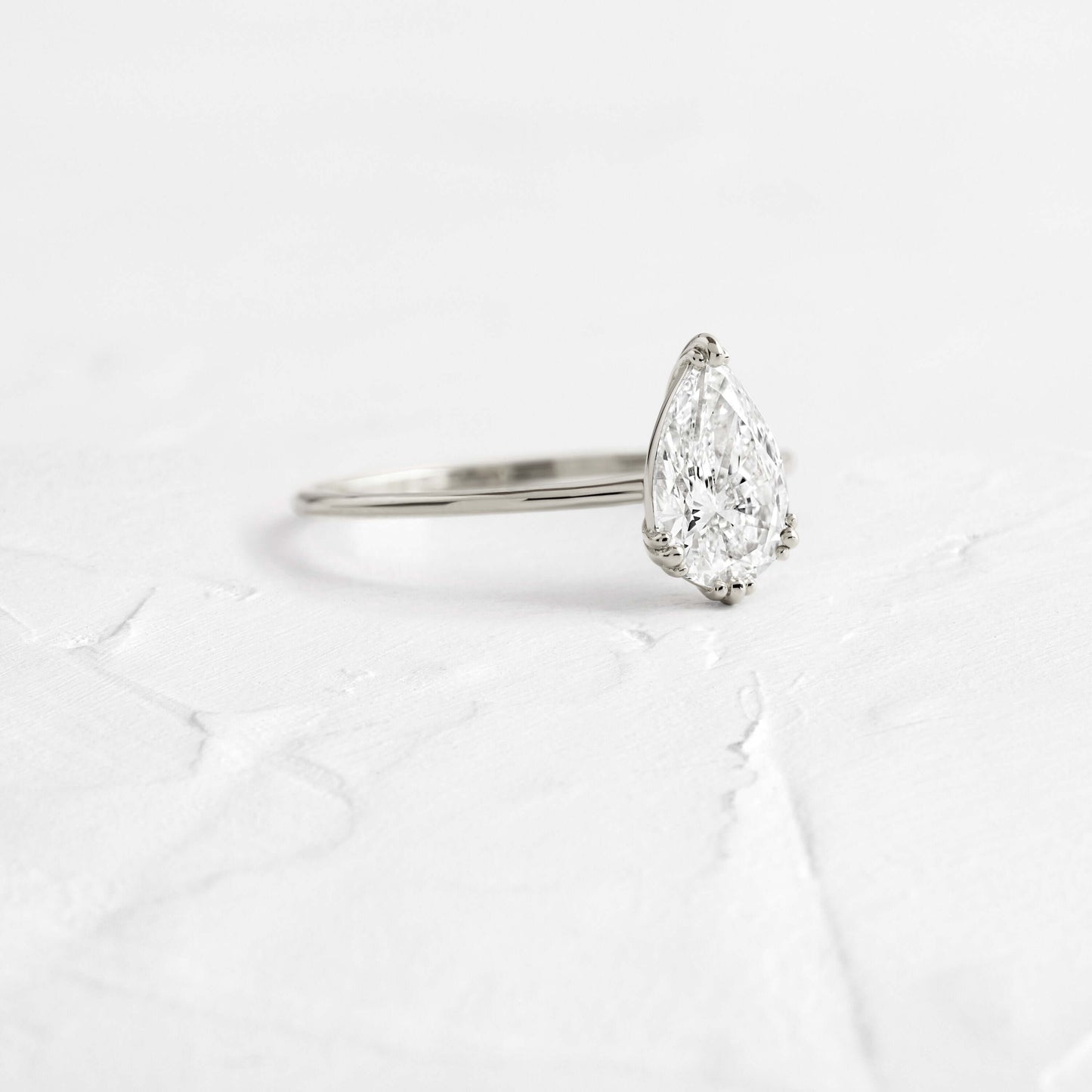 Solitaire Triple Prong-Pear Lab Grown Diamond Engagement Ring - Side view