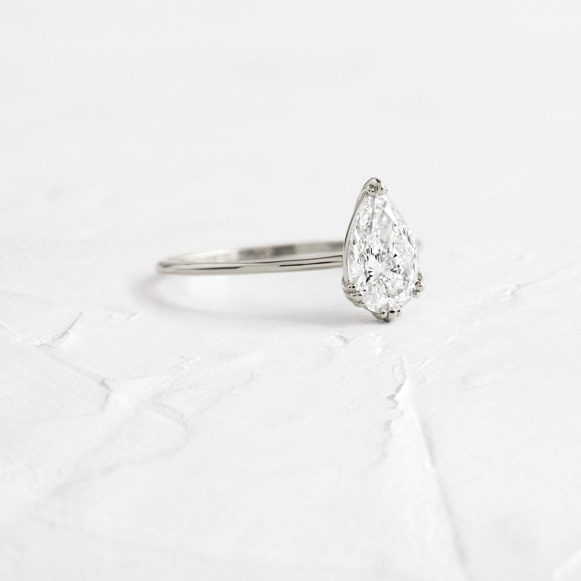 Solitaire Triple Prong-Pear Lab Grown Diamond Engagement Ring - Side view